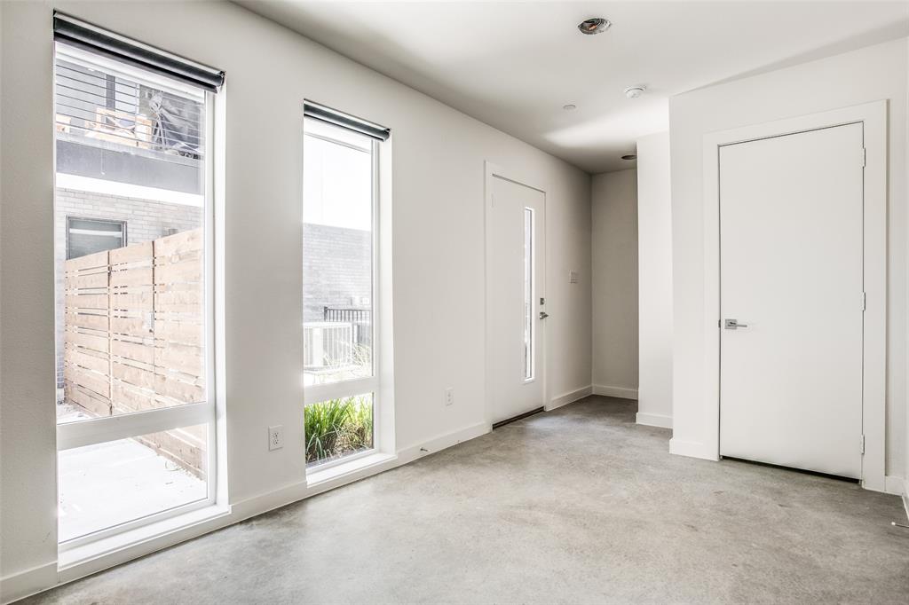 2190 Bennett Avenue, Unit 301 Dallas, TX 75206 - Photo 4 of 21 a view of empty room with window