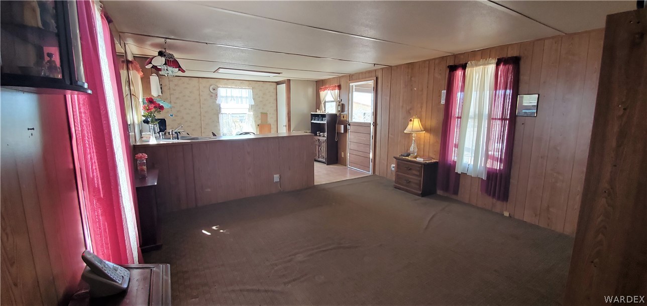 524 South Eden Road Golden Valley, AZ 86413 - Photo 12 of 32 a view of a room with furniture and a window
