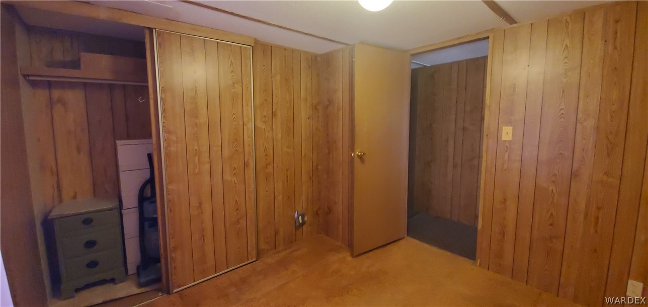 524 South Eden Road Golden Valley, AZ 86413 - Photo 30 of 32 a view of an entryway with wooden wall