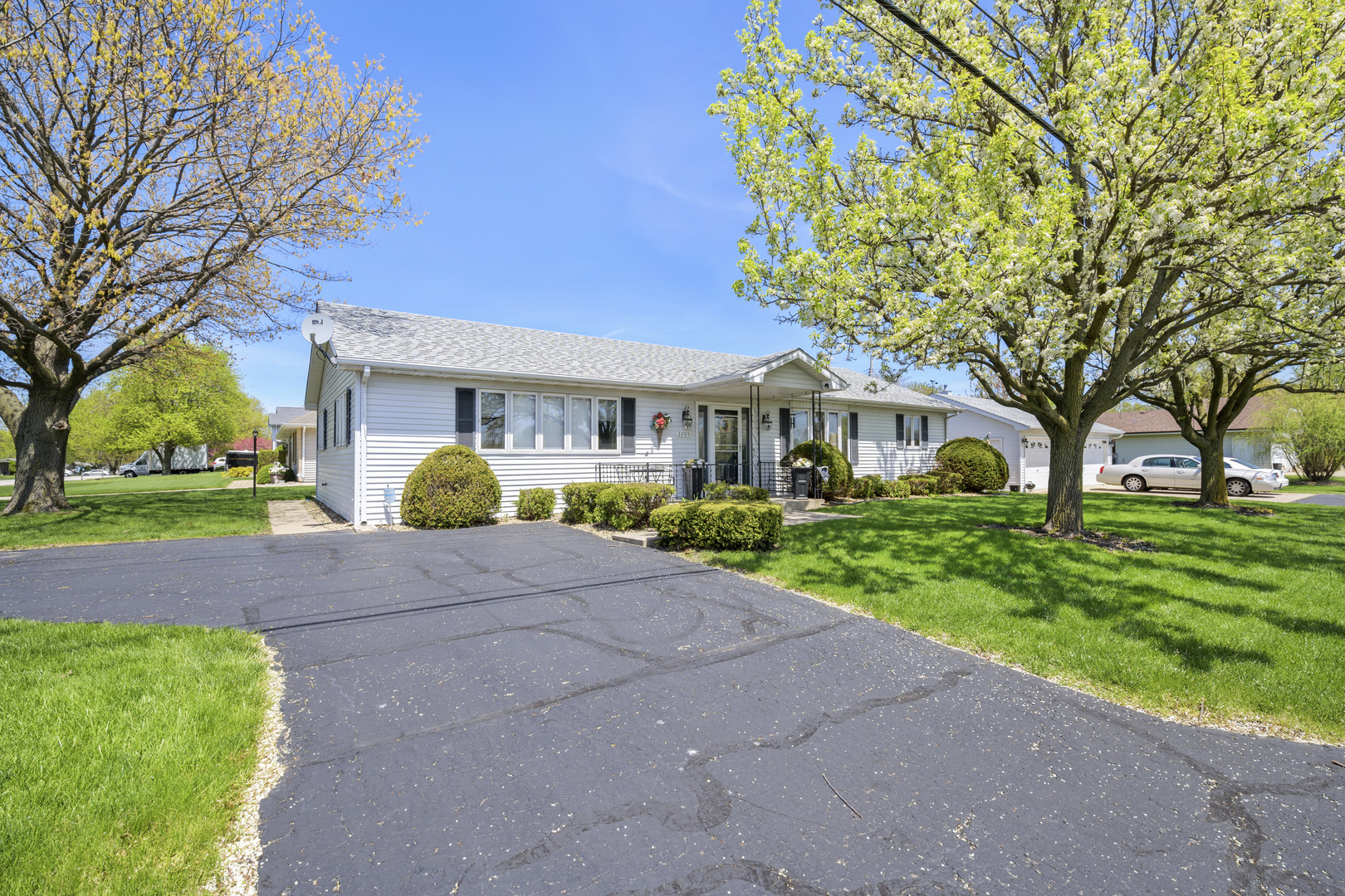 3205 Caton Farm Road Joliet, IL 60431 - Photo 1 of 20 a front view of a house with garden and porch