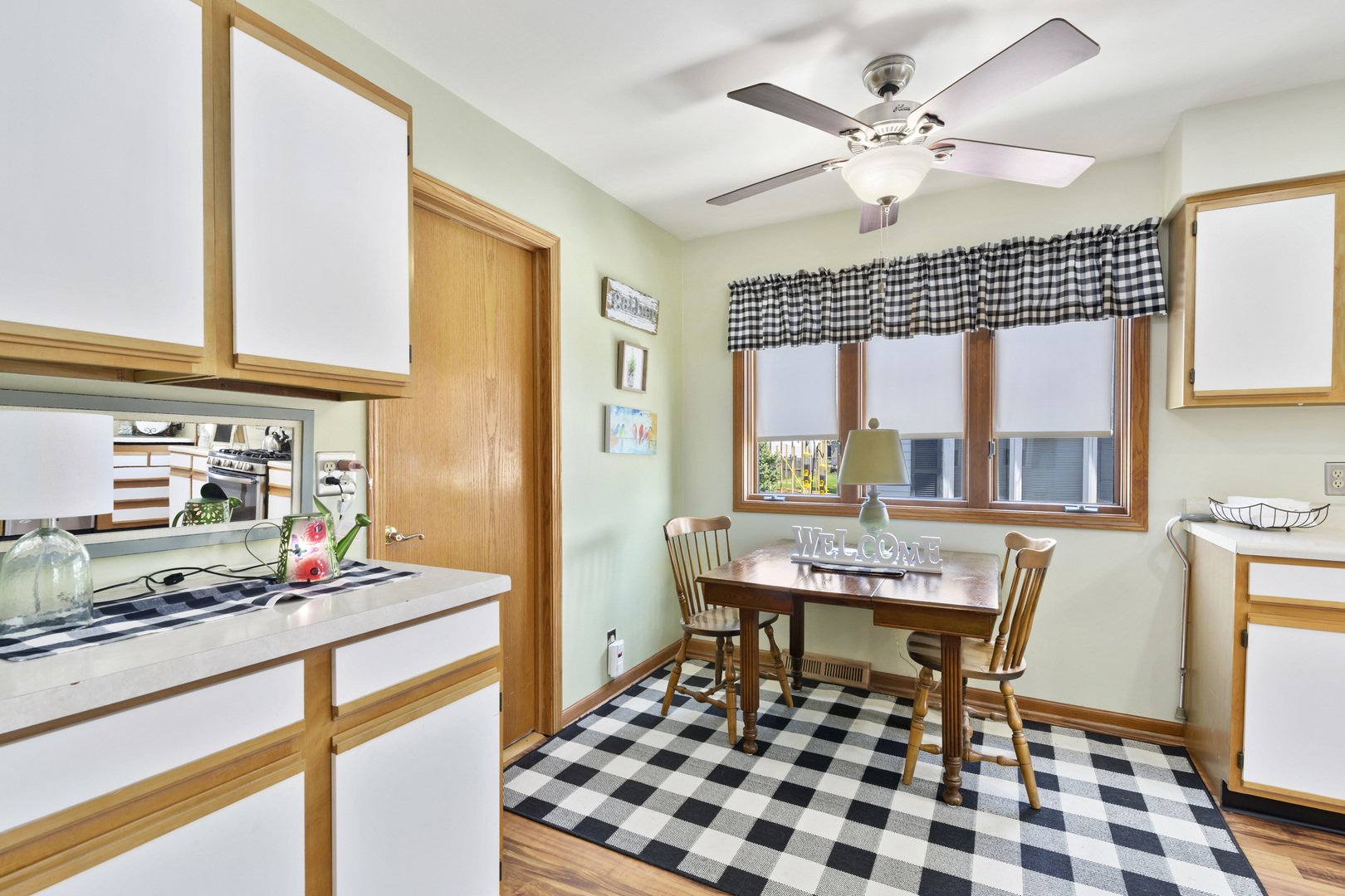 3205 Caton Farm Road Joliet, IL 60431 - Photo 17 of 20 a dining room with a table and chairs