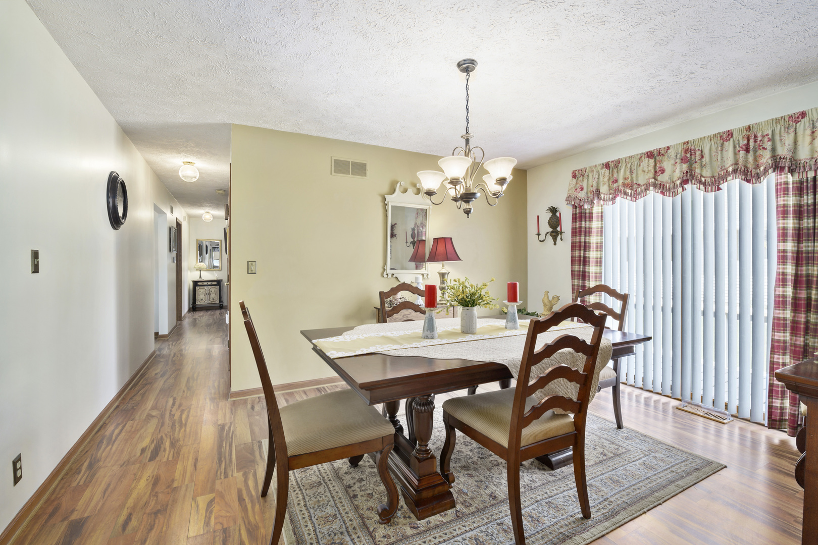 3205 Caton Farm Road Joliet, IL 60431 - Photo 18 of 20 a view of a dining room with furniture and chandelier