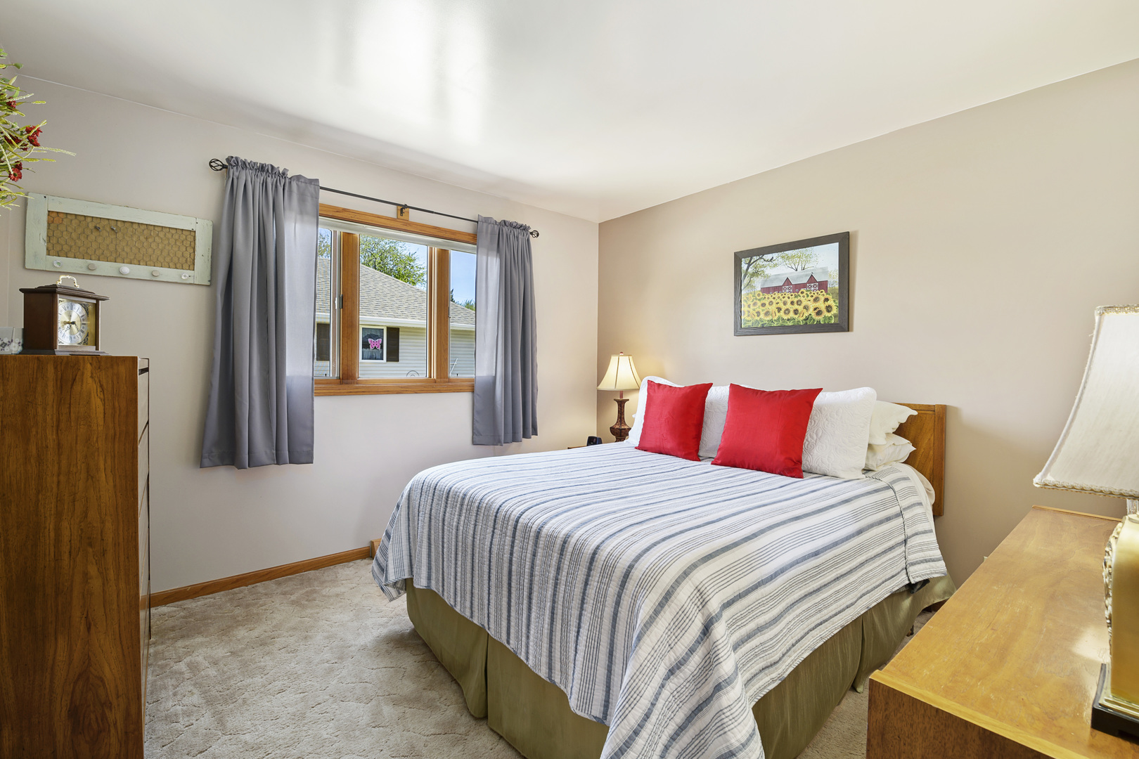 3205 Caton Farm Road Joliet, IL 60431 - Photo 6 of 20 a bedroom with a bed and a painting on the wall