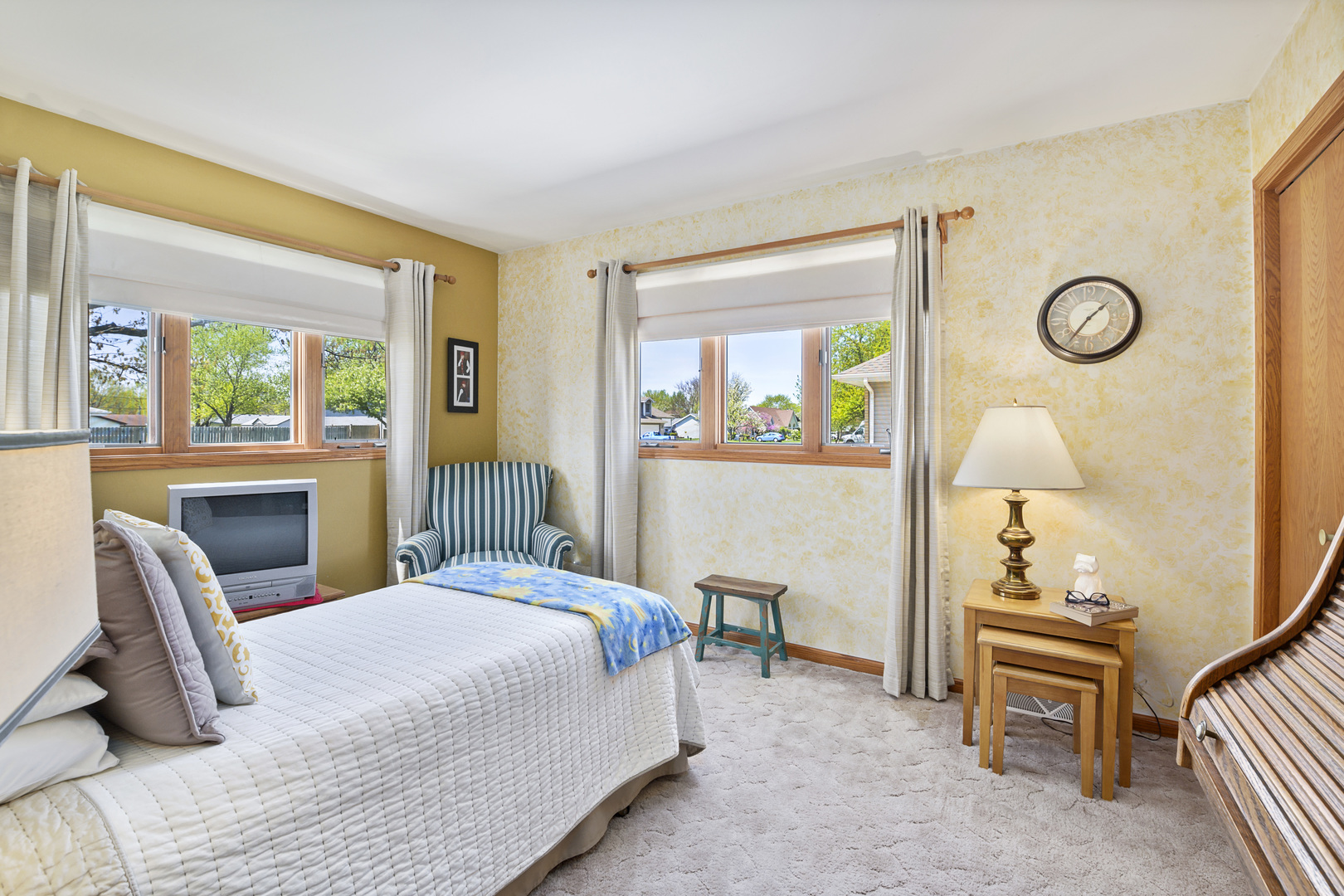 3205 Caton Farm Road Joliet, IL 60431 - Photo 7 of 20 a bedroom with a bed and a table in it