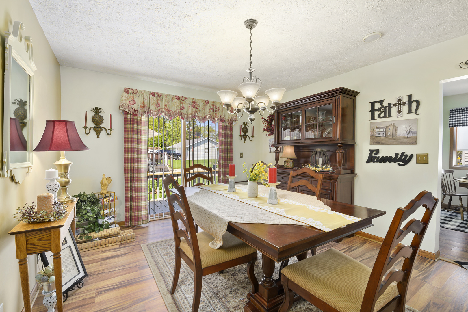 3205 Caton Farm Road Joliet, IL 60431 - Photo 8 of 20 a view of a dining room with furniture window and wooden floor
