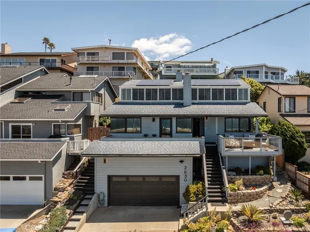 a front view of a house with yard street view
