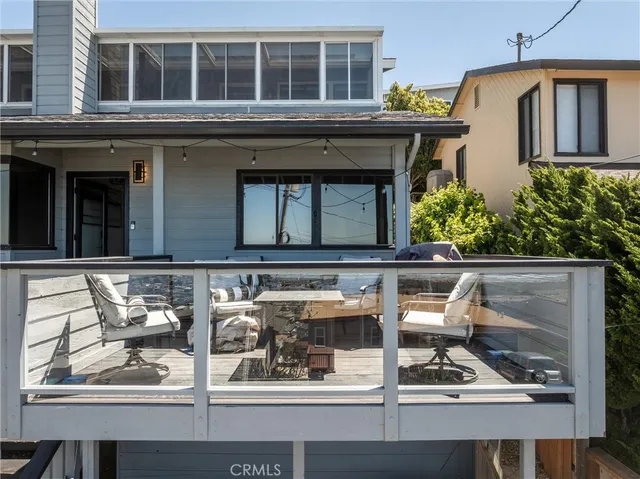 front view of house with large windows