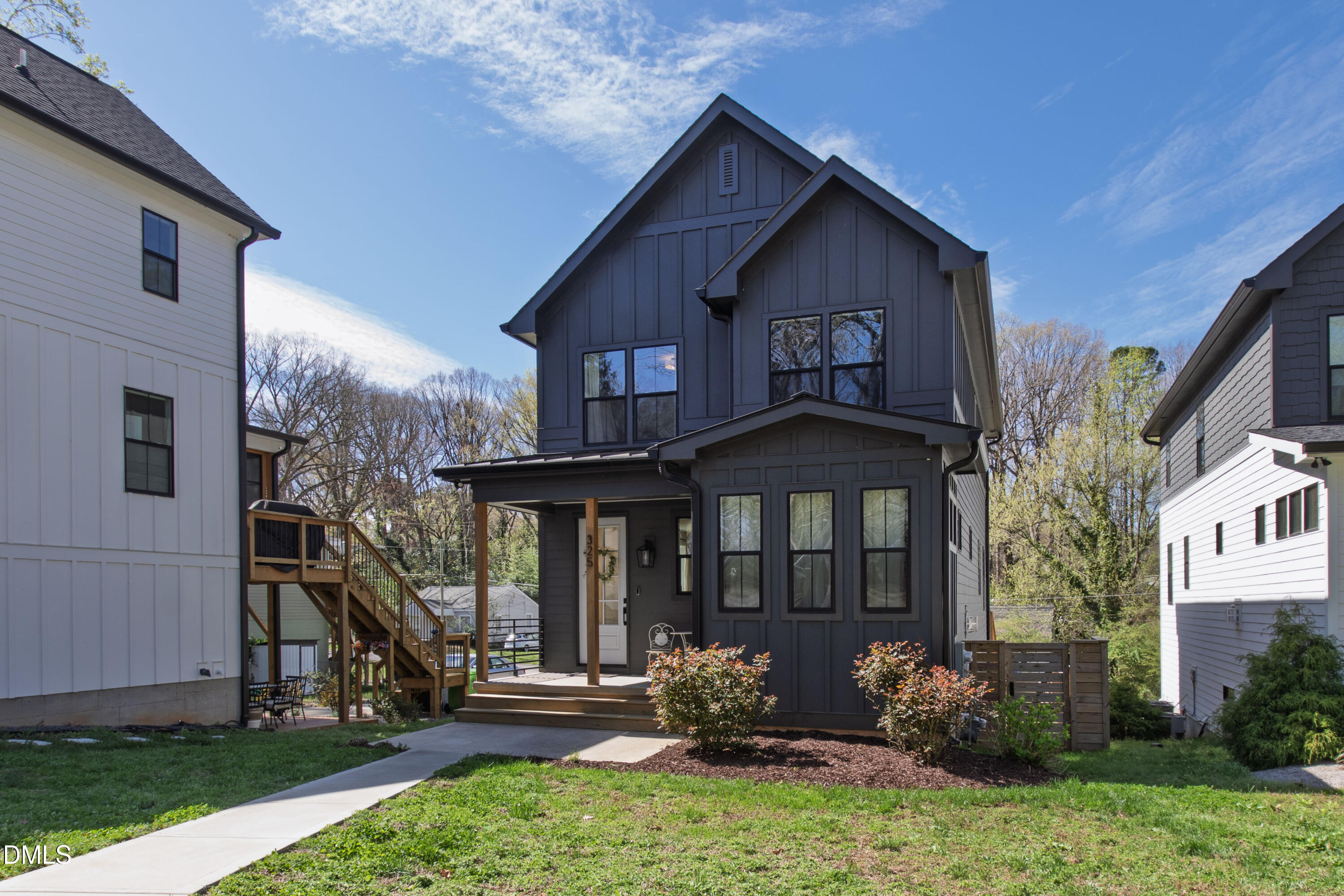 325 Grand Avenue Raleigh, NC 27606 - Photo 1 of 46 a front view of a house with garden