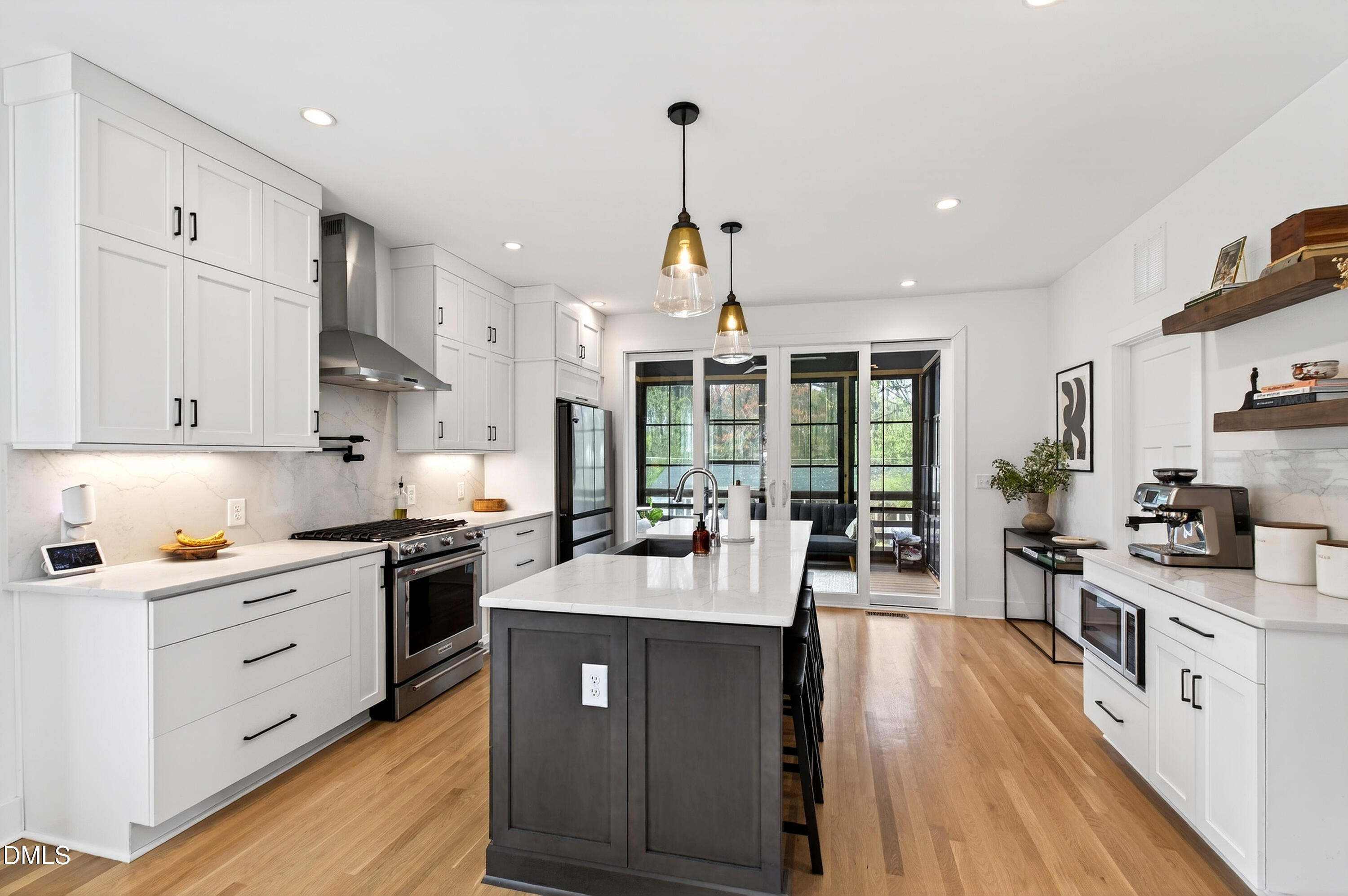 325 Grand Avenue Raleigh, NC 27606 - Photo 14 of 46 a kitchen with stainless steel appliances granite countertop a sink stove and refrigerator