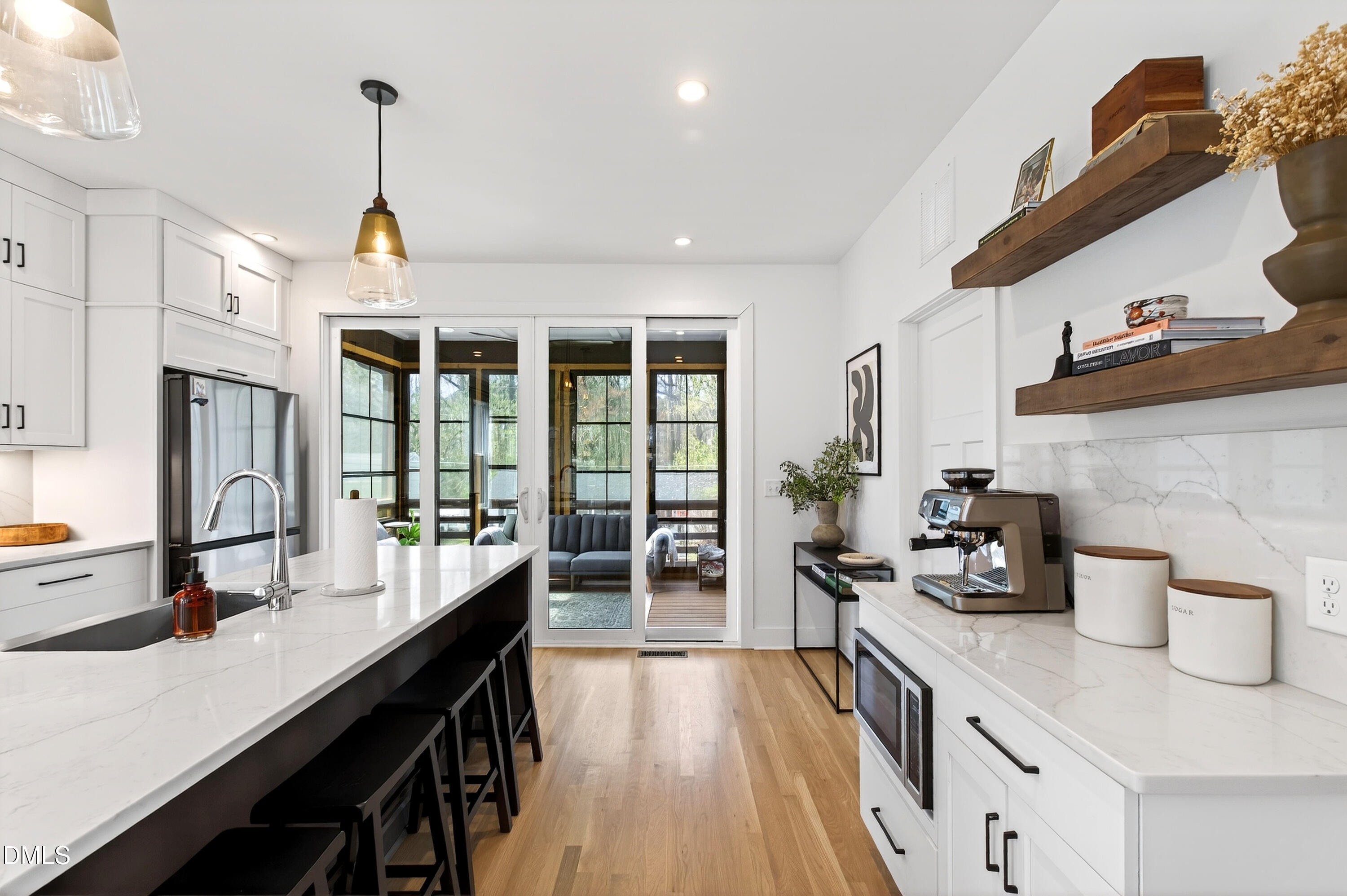 325 Grand Avenue Raleigh, NC 27606 - Photo 15 of 46 a kitchen with sink and refrigerator