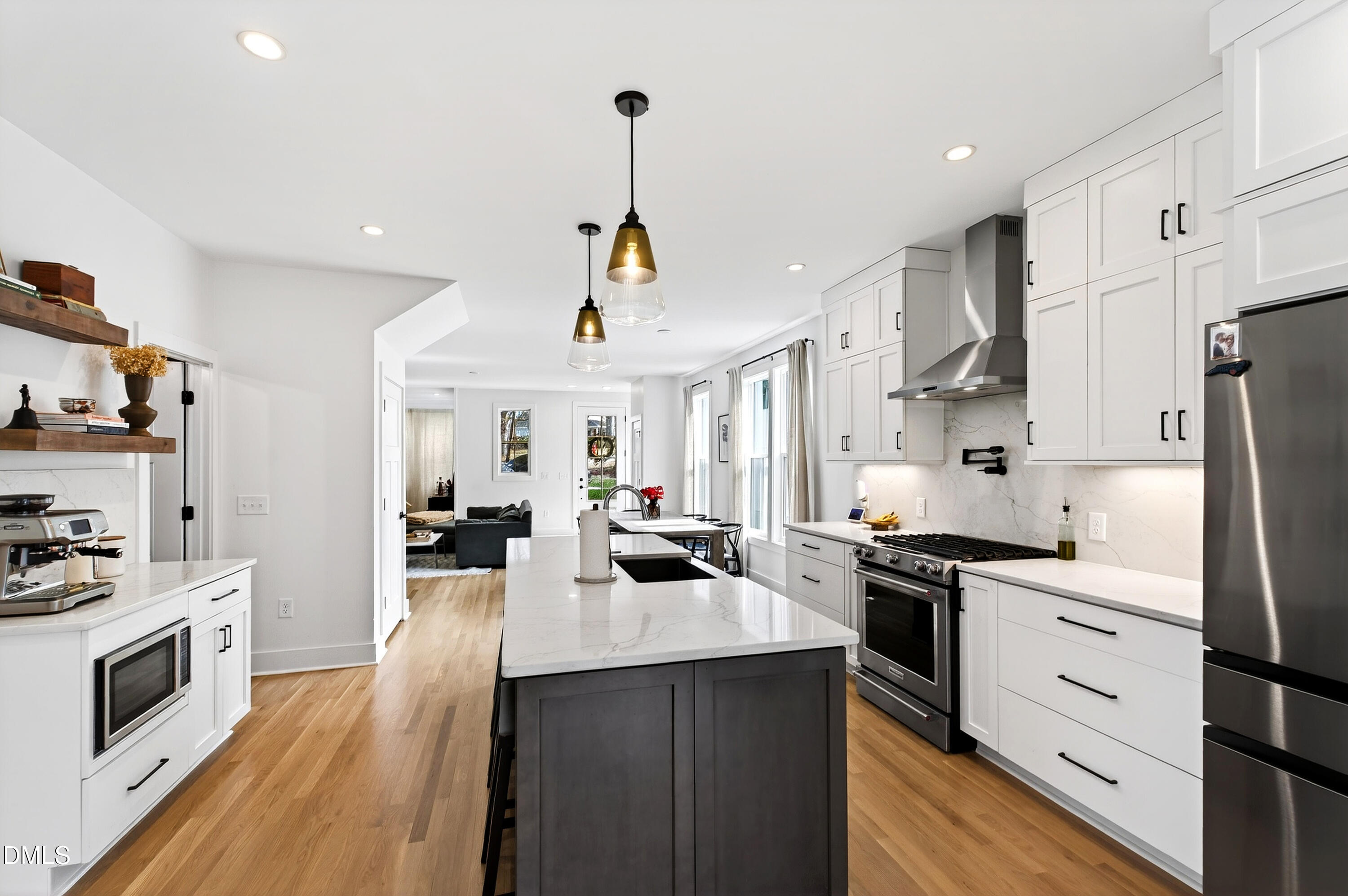 325 Grand Avenue Raleigh, NC 27606 - Photo 17 of 46 a kitchen with stainless steel appliances a sink stove and refrigerator