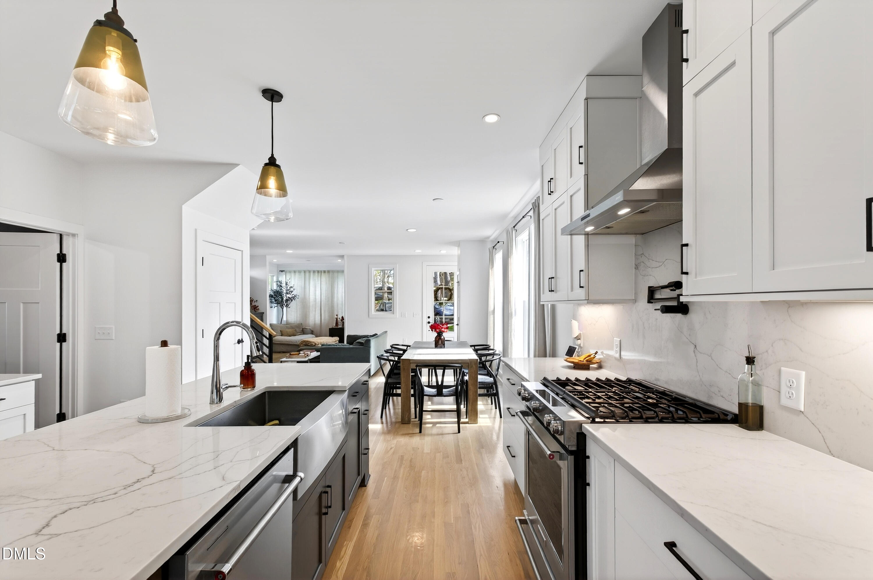 325 Grand Avenue Raleigh, NC 27606 - Photo 18 of 46 a kitchen with sink stove and cabinets
