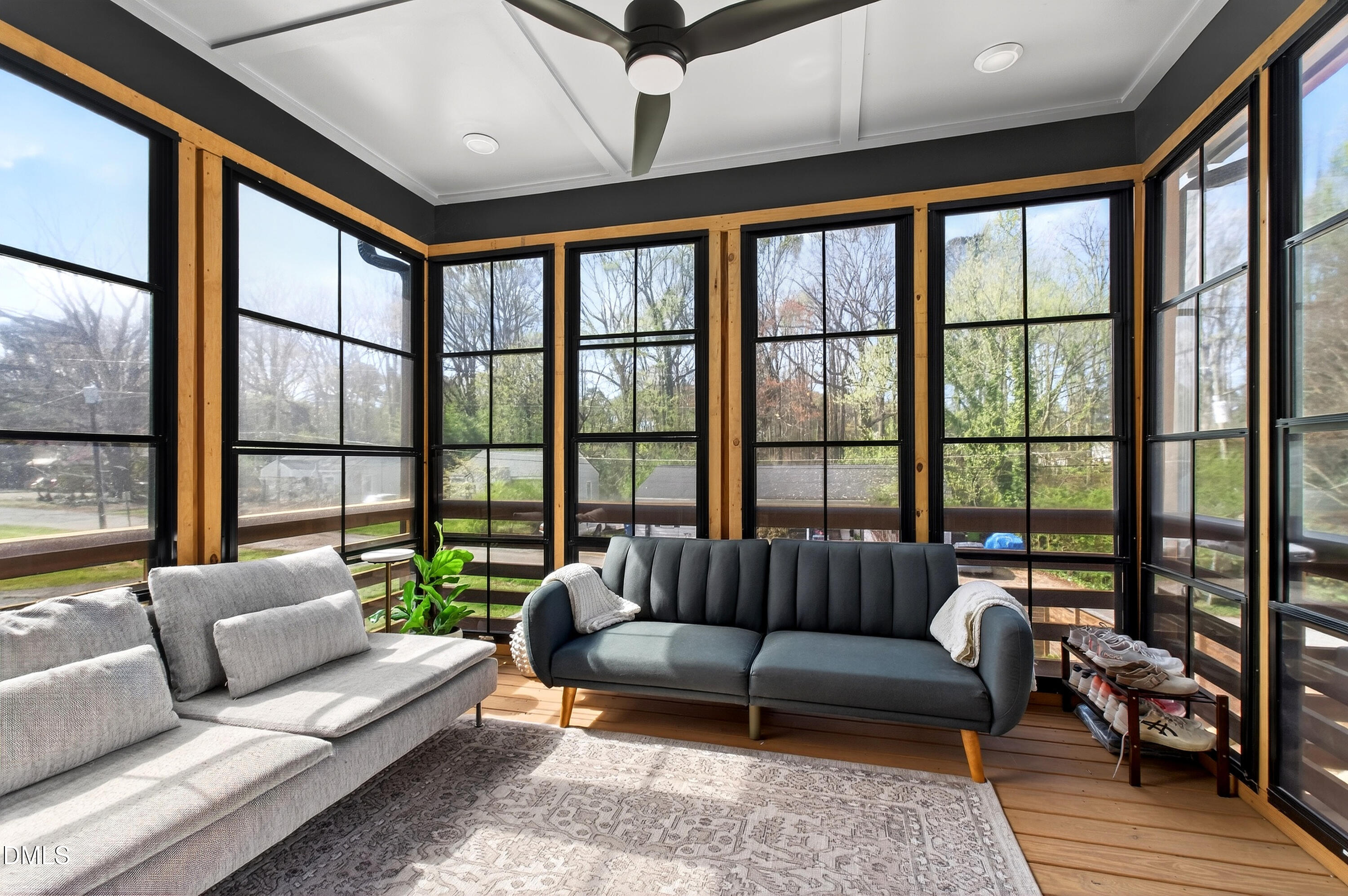 325 Grand Avenue Raleigh, NC 27606 - Photo 21 of 46 a living room with furniture and a large window