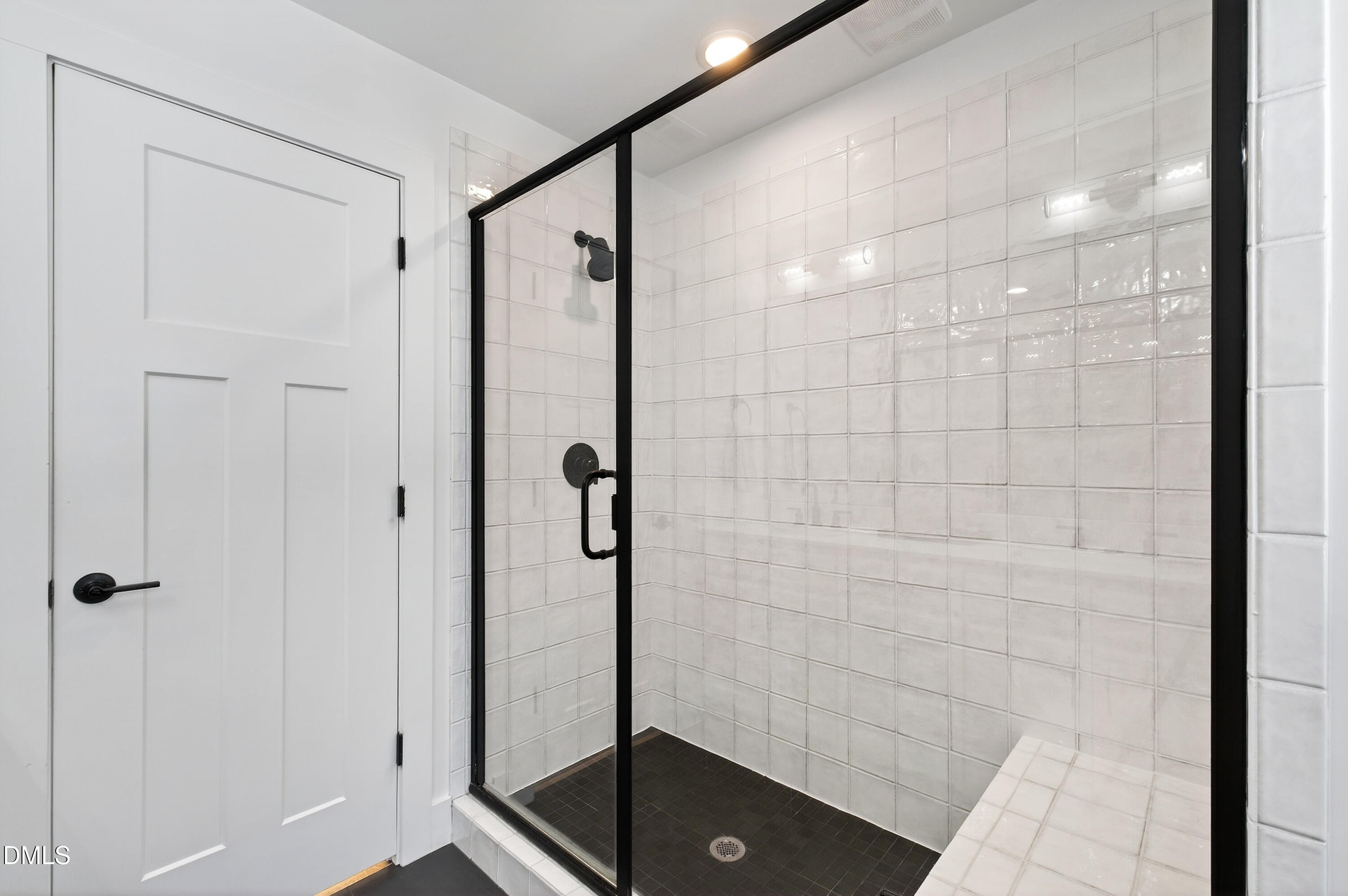 325 Grand Avenue Raleigh, NC 27606 - Photo 28 of 46 a bathroom with a shower and a sink