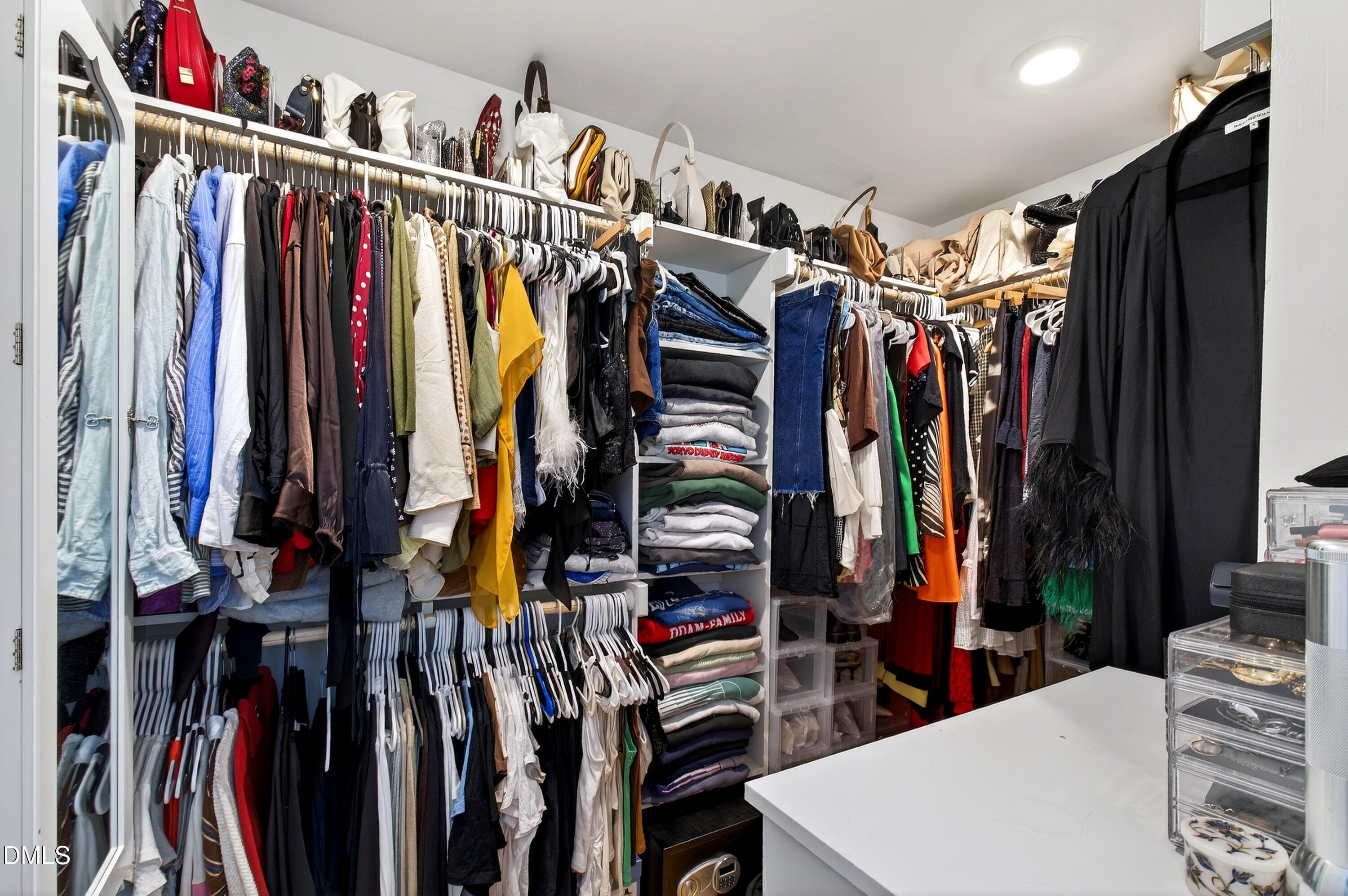 325 Grand Avenue Raleigh, NC 27606 - Photo 29 of 46 a view of walk in closet with clothes