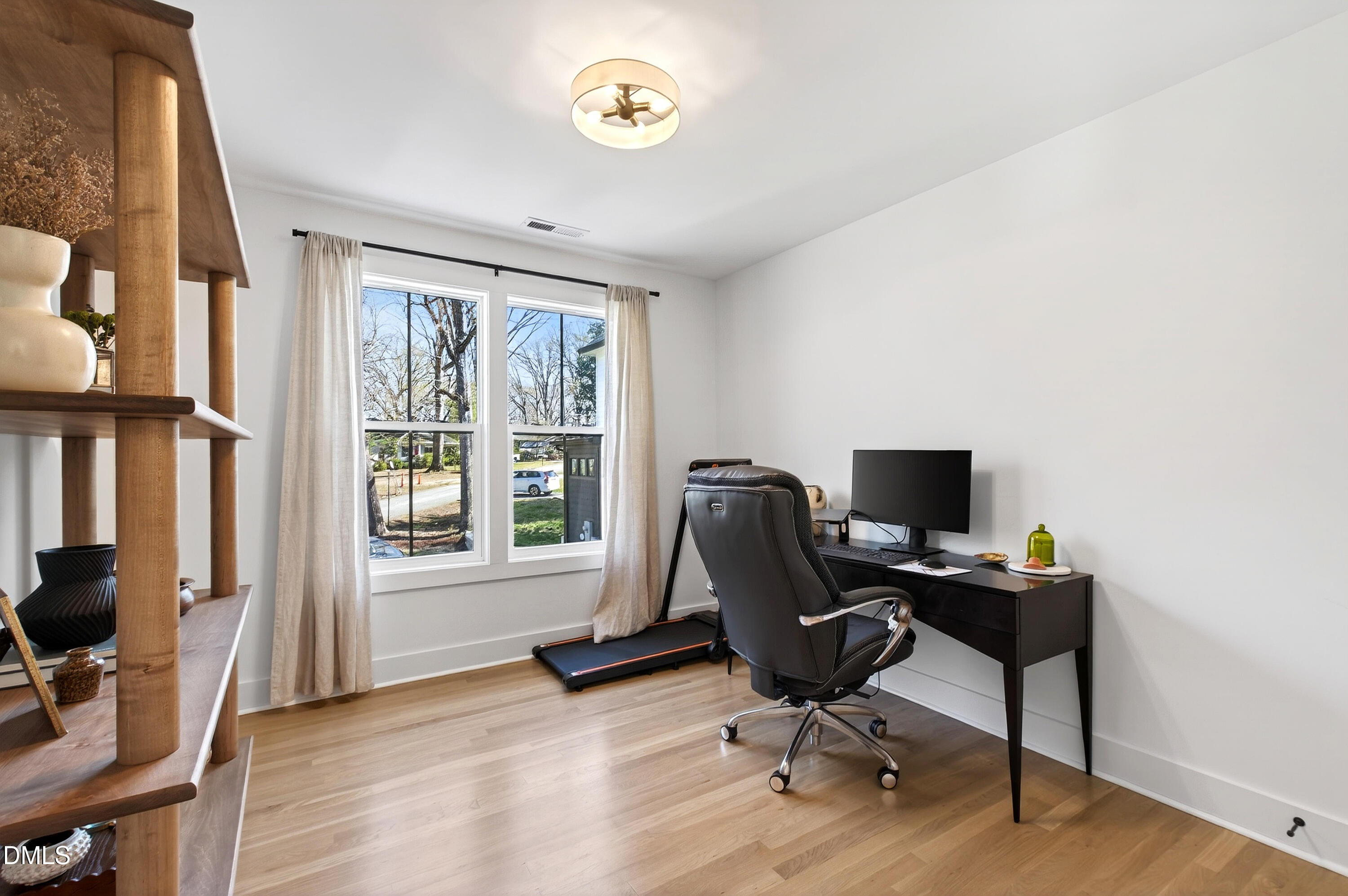 325 Grand Avenue Raleigh, NC 27606 - Photo 30 of 46 a view of a workspace with furniture and a window