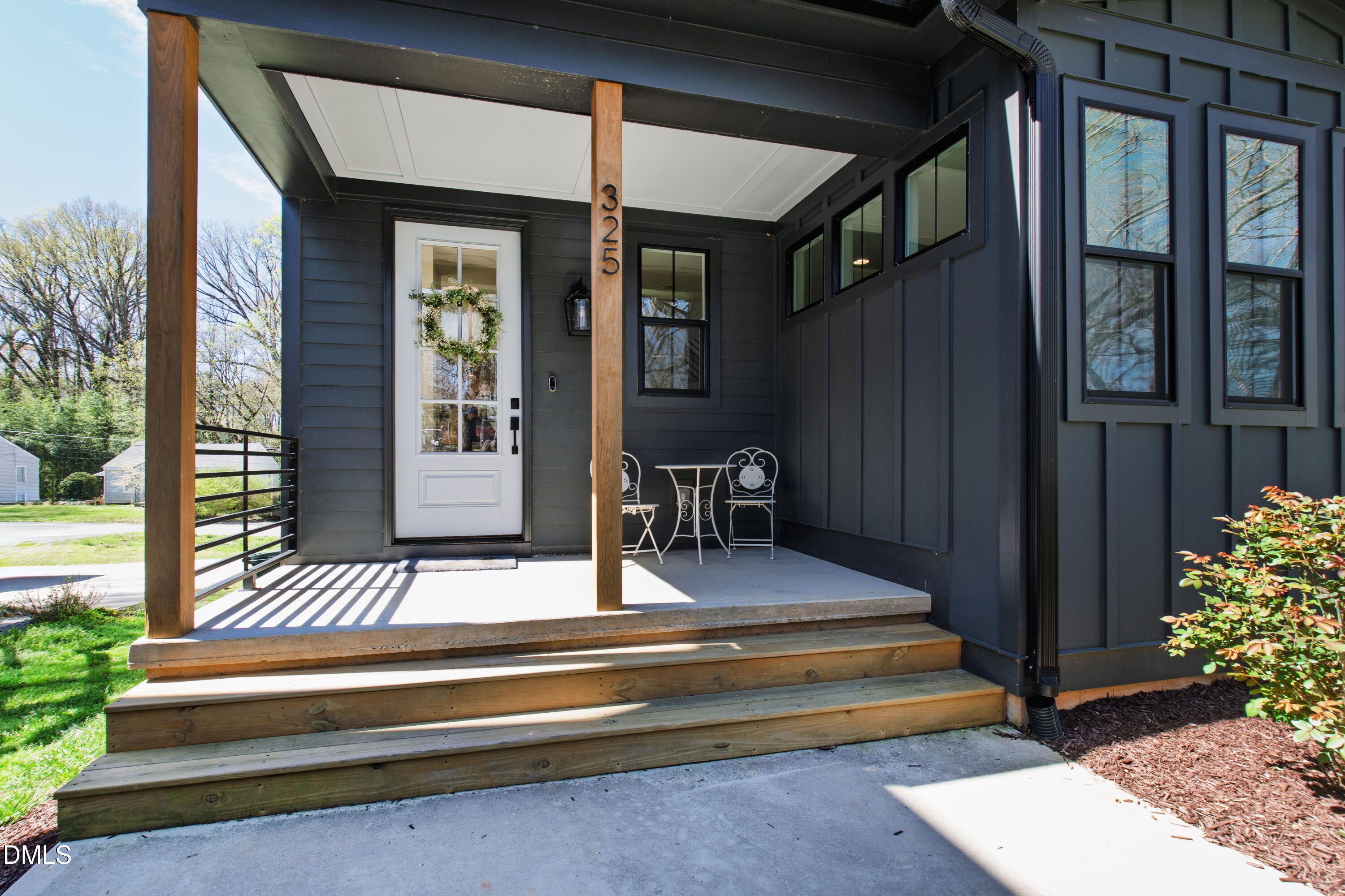 325 Grand Avenue Raleigh, NC 27606 - Photo 3 of 46 a view of patio with chairs and a potted plant