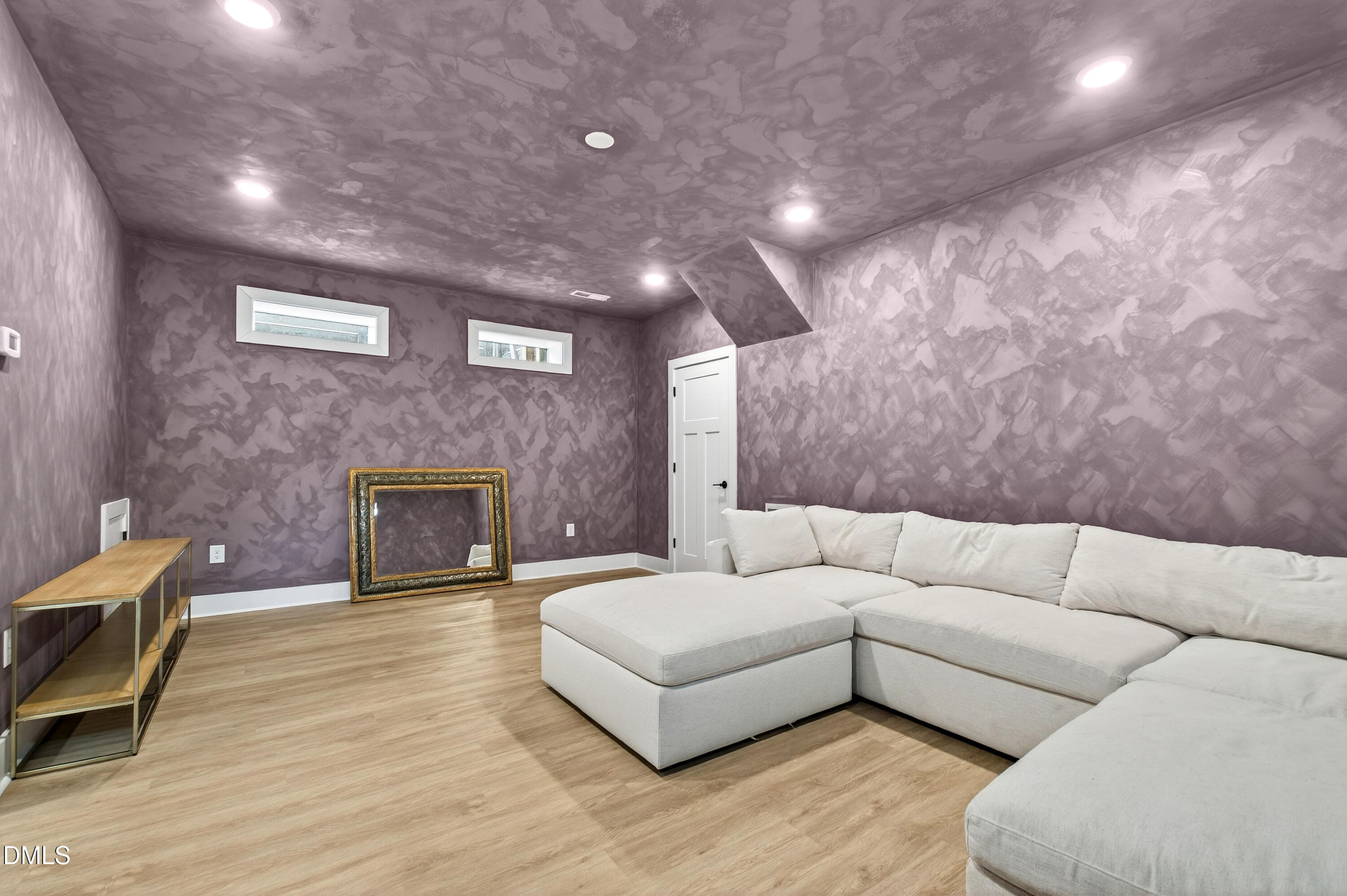 325 Grand Avenue Raleigh, NC 27606 - Photo 36 of 46 a living room with furniture and a fireplace