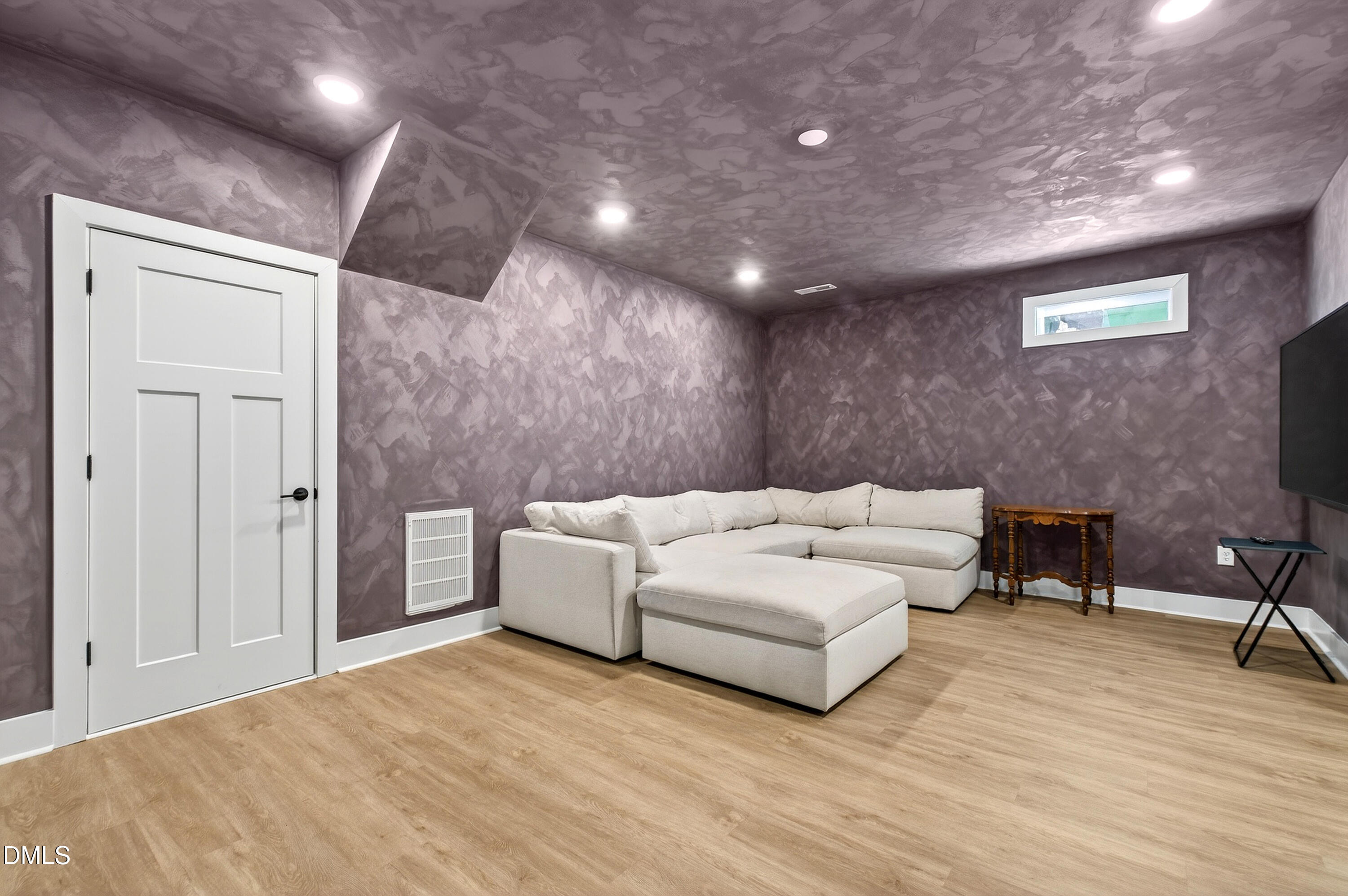 325 Grand Avenue Raleigh, NC 27606 - Photo 38 of 46 a spacious bedroom with a bed and a desk