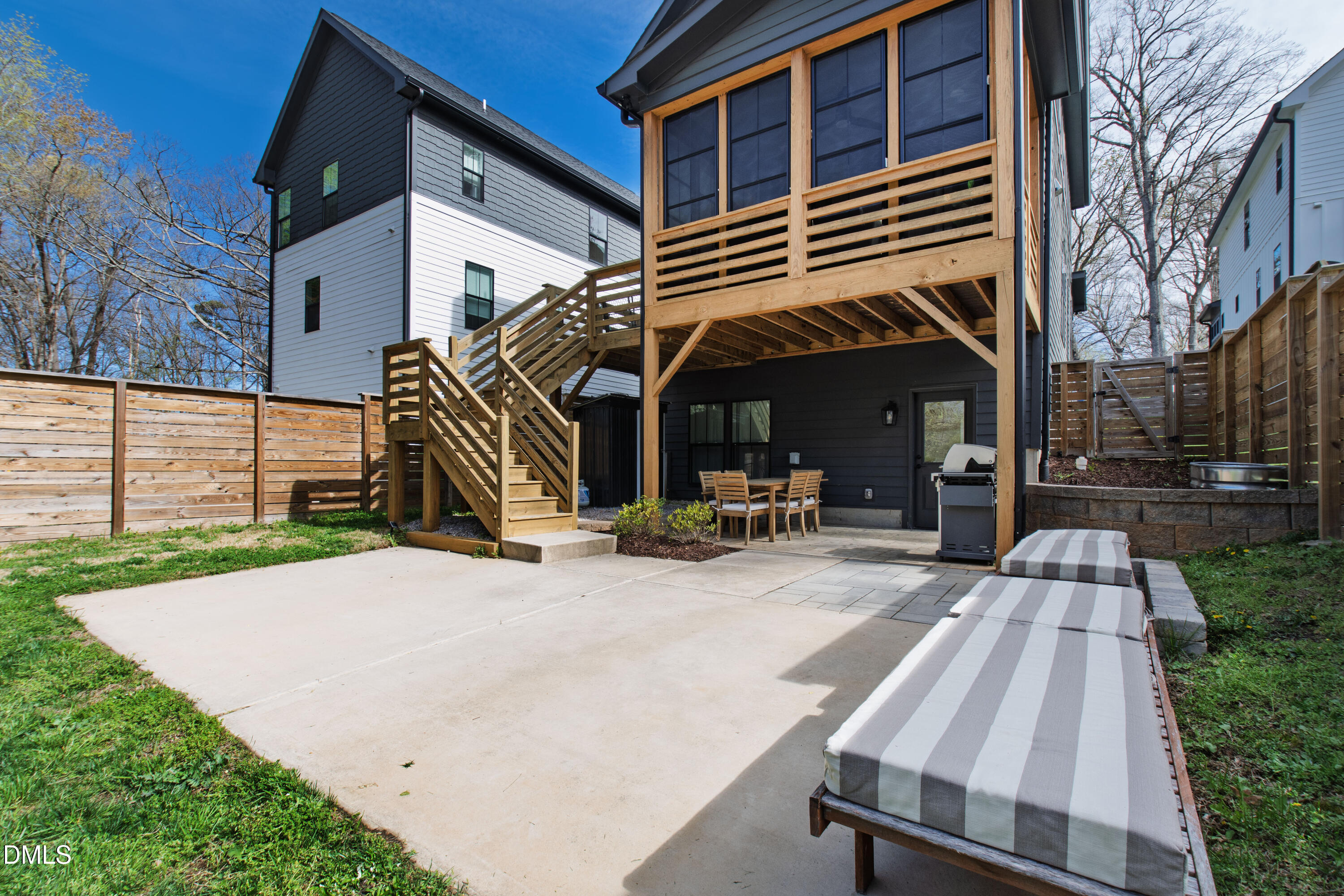 325 Grand Avenue Raleigh, NC 27606 - Photo 44 of 46 a view of outdoor space yard deck patio and fire pit