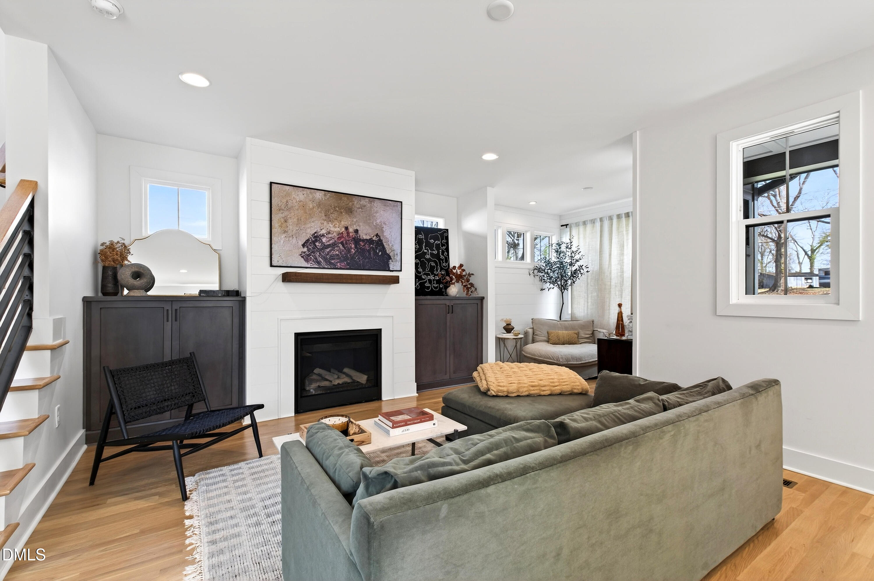 325 Grand Avenue Raleigh, NC 27606 - Photo 6 of 46 a living room with furniture and a fireplace