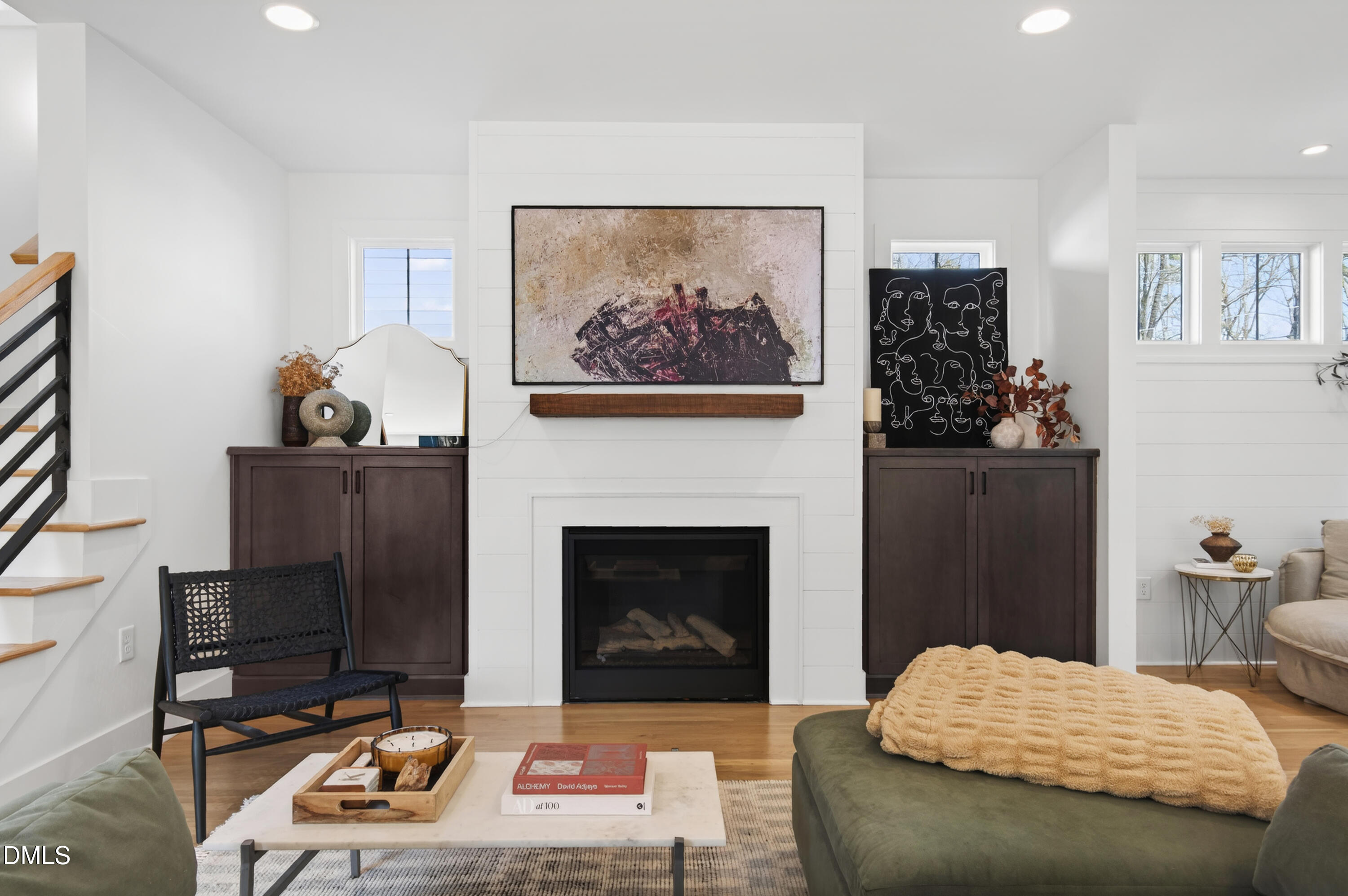 325 Grand Avenue Raleigh, NC 27606 - Photo 7 of 46 a bedroom with a bed and a fireplace