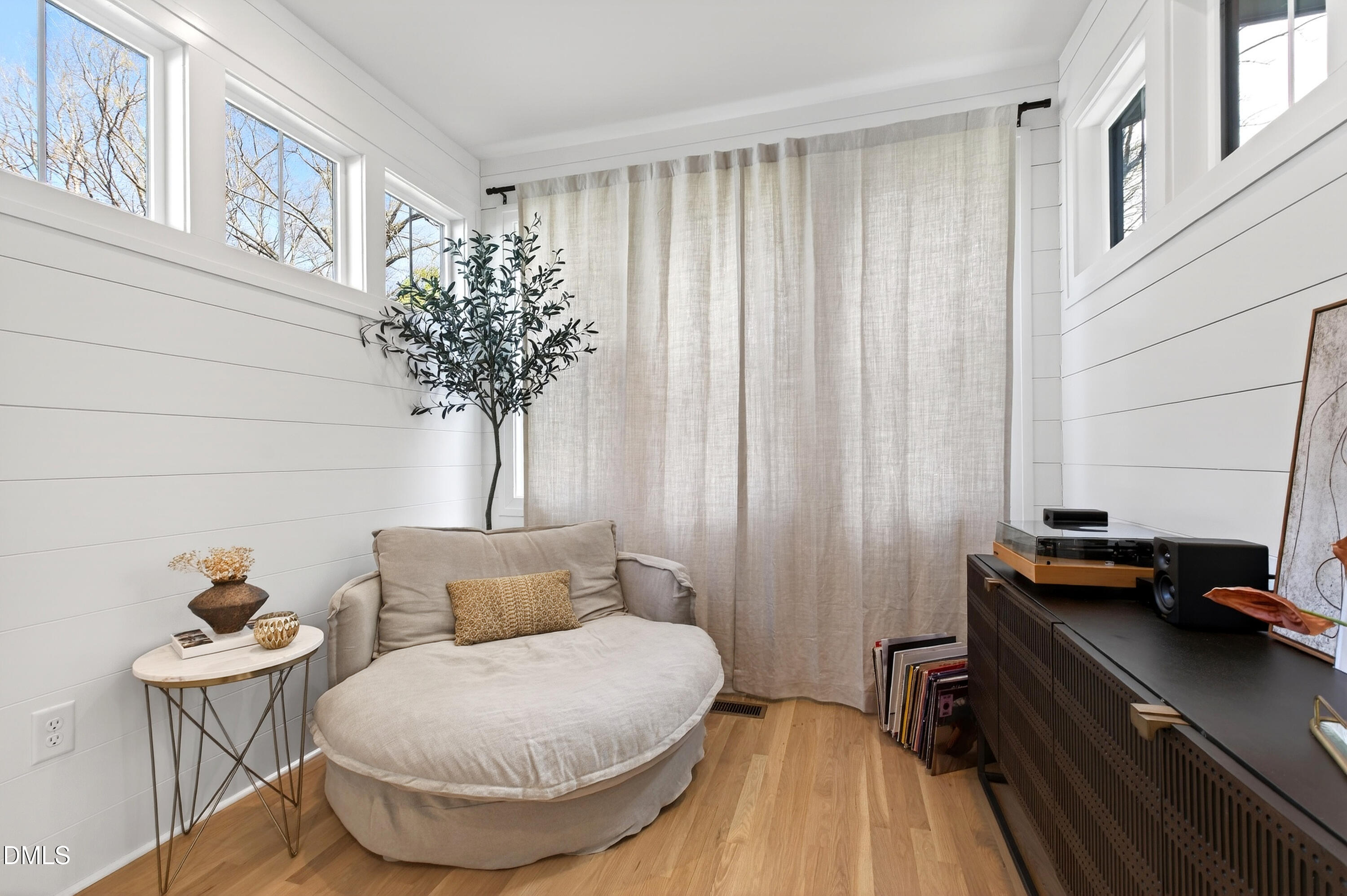 325 Grand Avenue Raleigh, NC 27606 - Photo 9 of 46 a living room with furniture and a potted plant