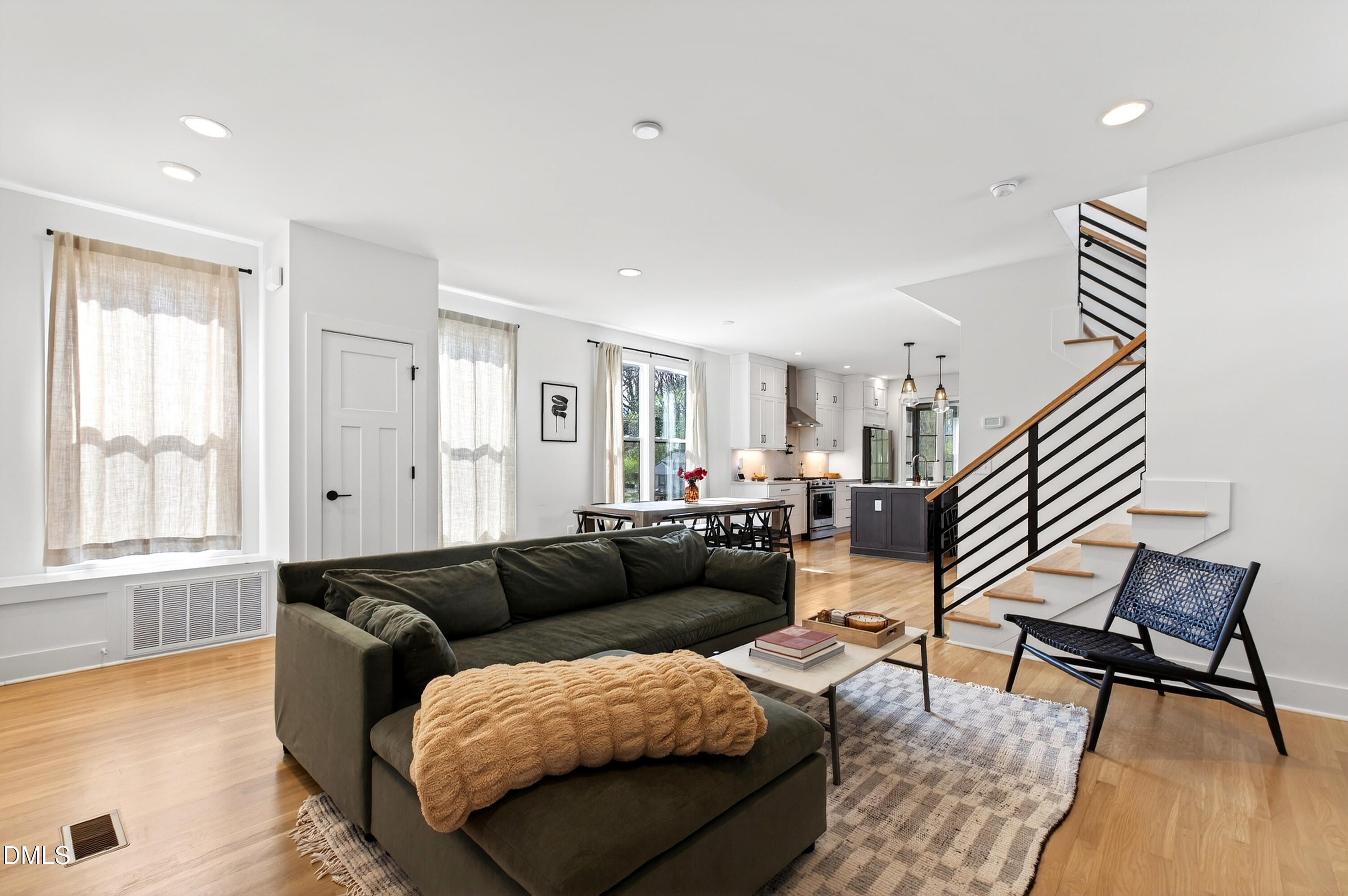 325 Grand Avenue Raleigh, NC 27606 - Photo 10 of 46 a living room with furniture and wooden floor