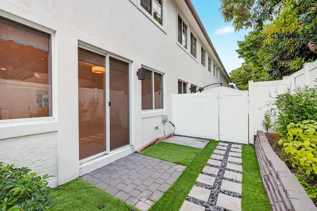 a view of a back yard of the house