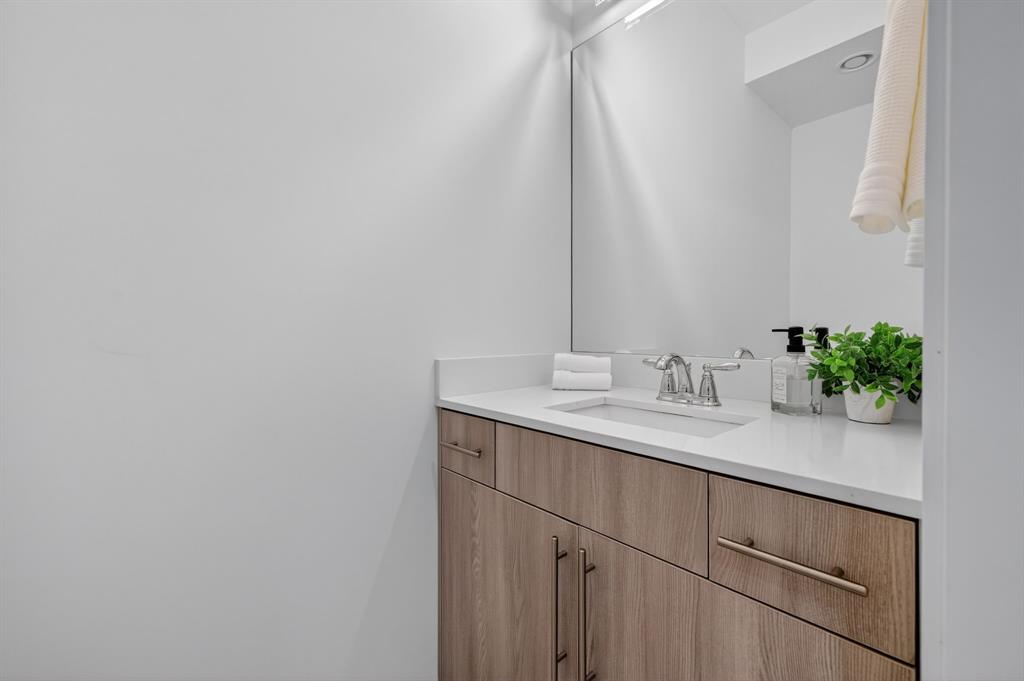 737 Southeast 1st Court, Unit 737 Pompano Beach, FL 33060 - Photo 19 of 53 a bathroom with a sink and a mirror