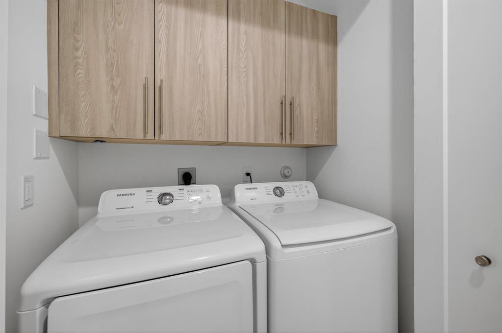 737 Southeast 1st Court, Unit 737 Pompano Beach, FL 33060 - Photo 21 of 53 a utility room with dryer and washer