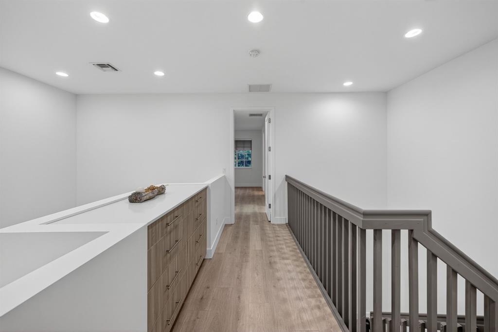 737 Southeast 1st Court, Unit 737 Pompano Beach, FL 33060 - Photo 24 of 53 a view of a hallway with wooden floor
