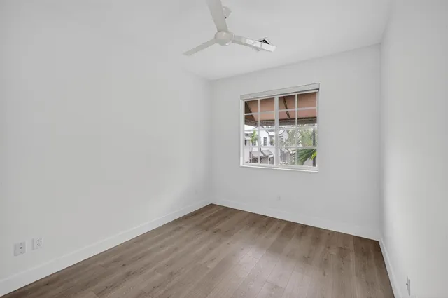 a bathroom with a sink double vanity and a mirror
