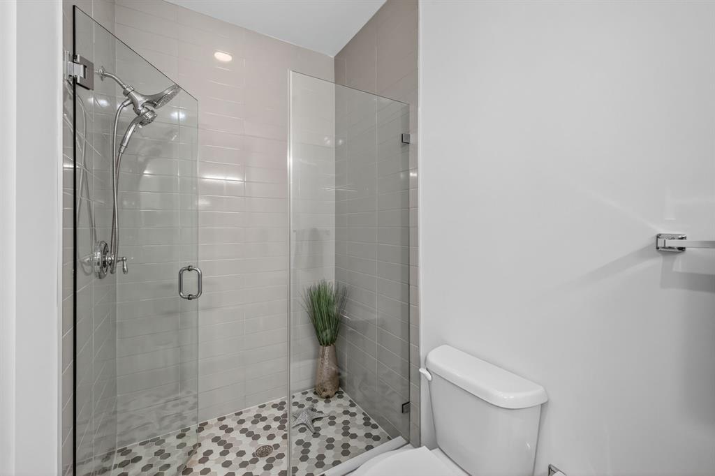 737 Southeast 1st Court, Unit 737 Pompano Beach, FL 33060 - Photo 37 of 53 a bathroom with a shower a toilet and a shower