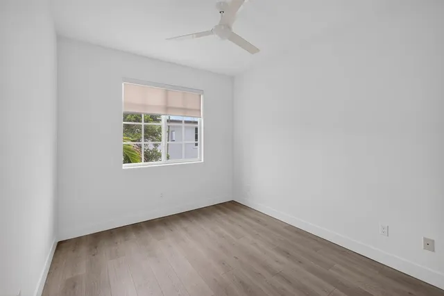 a front view of a house with garage