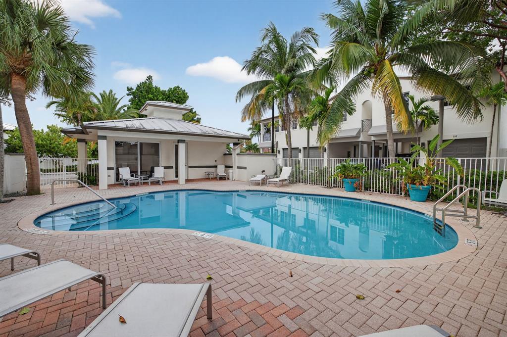 737 Southeast 1st Court, Unit 737 Pompano Beach, FL 33060 - Photo 47 of 53 a view of a house with swimming pool and sitting area