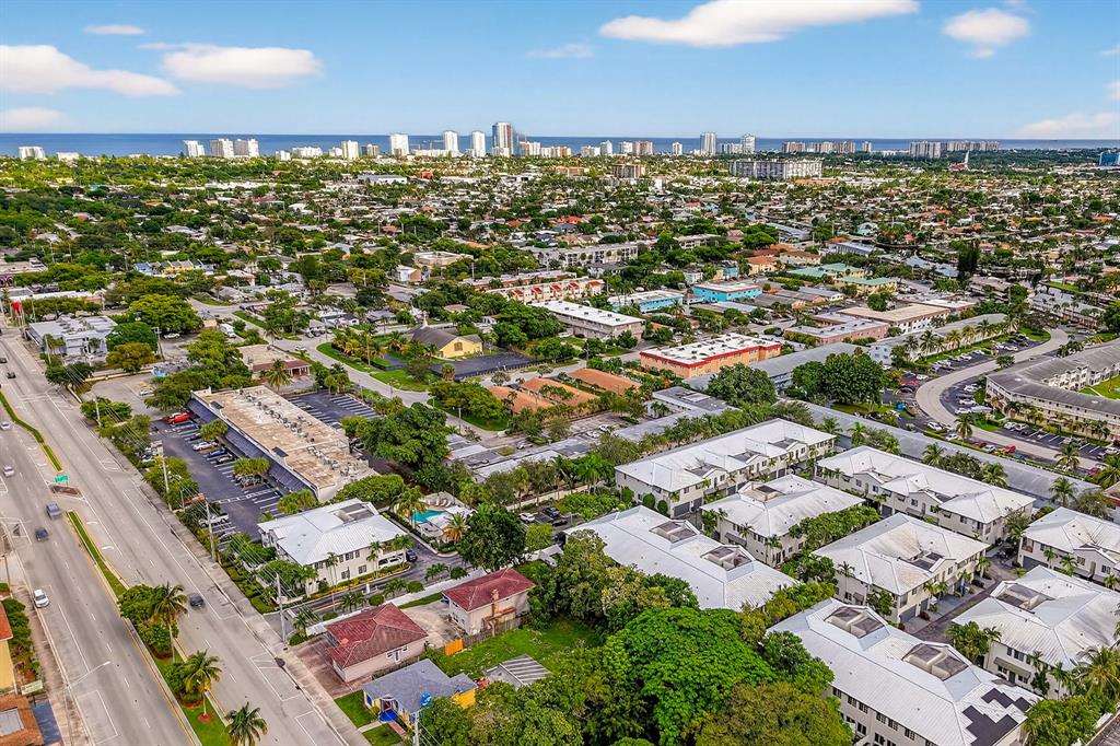 737 Southeast 1st Court, Unit 737 Pompano Beach, FL 33060 - Photo 49 of 53 an aerial view of a city with lots of residential buildings