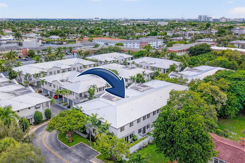 737 Southeast 1st Court, Unit 737 Pompano Beach, FL 33060 - Photo 50 of 53 an aerial view of residential houses with outdoor space
