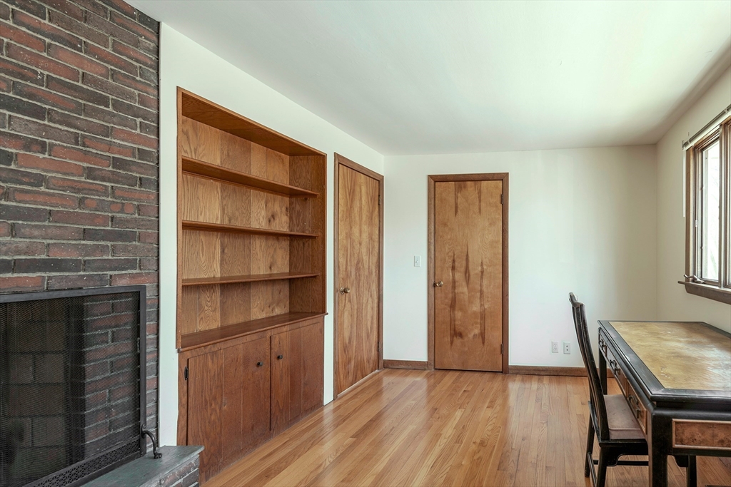 235 Argilla Road Ipswich, MA 01938 - Photo 12 of 28 a view of room with wooden floor and windows