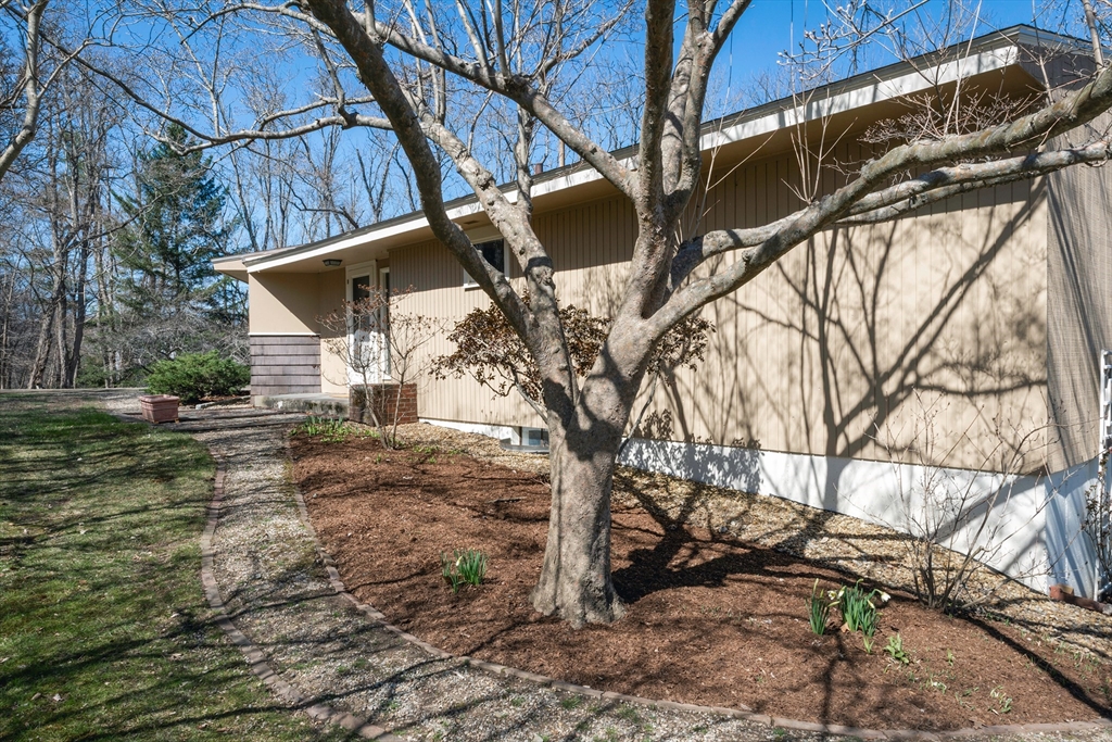 235 Argilla Road Ipswich, MA 01938 - Photo 20 of 28 a view of a house with a yard
