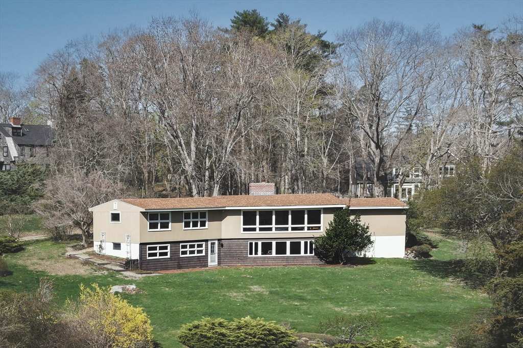 235 Argilla Road Ipswich, MA 01938 - Photo 2 of 28 a view of a house with a yard and sitting area