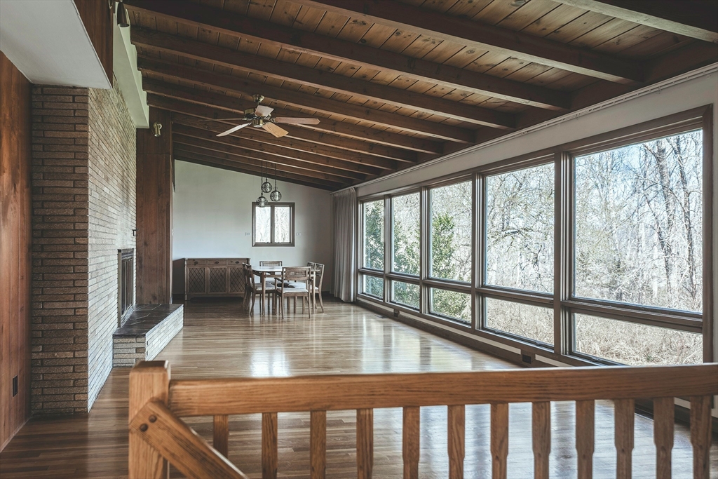 235 Argilla Road Ipswich, MA 01938 - Photo 9 of 28 a view of dining room with furniture wooden floor and chandelier