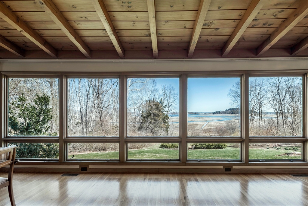 235 Argilla Road Ipswich, MA 01938 - Photo 10 of 28 a view of room with window and couch