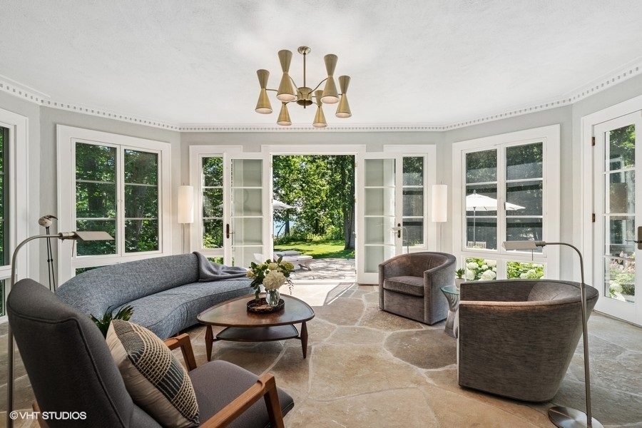 855 Sheridan Road Highland Park, IL 60035 - Photo 11 of 62 a living room with furniture and a large window