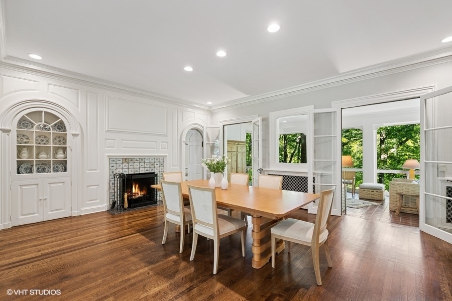 855 Sheridan Road Highland Park, IL 60035 - Photo 14 of 62 a view of a dining room with furniture window and wooden floor