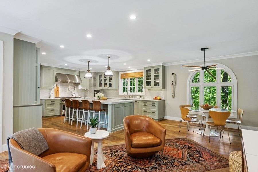 855 Sheridan Road Highland Park, IL 60035 - Photo 21 of 62 a outdoor living space with furniture a fireplace and a chandelier