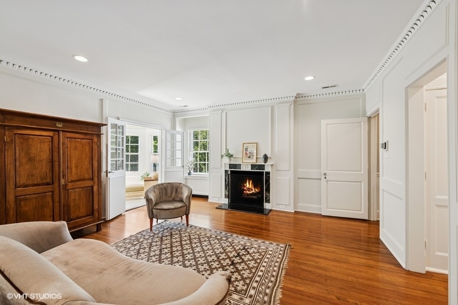 855 Sheridan Road Highland Park, IL 60035 - Photo 32 of 62 a living room with furniture and wooden floor