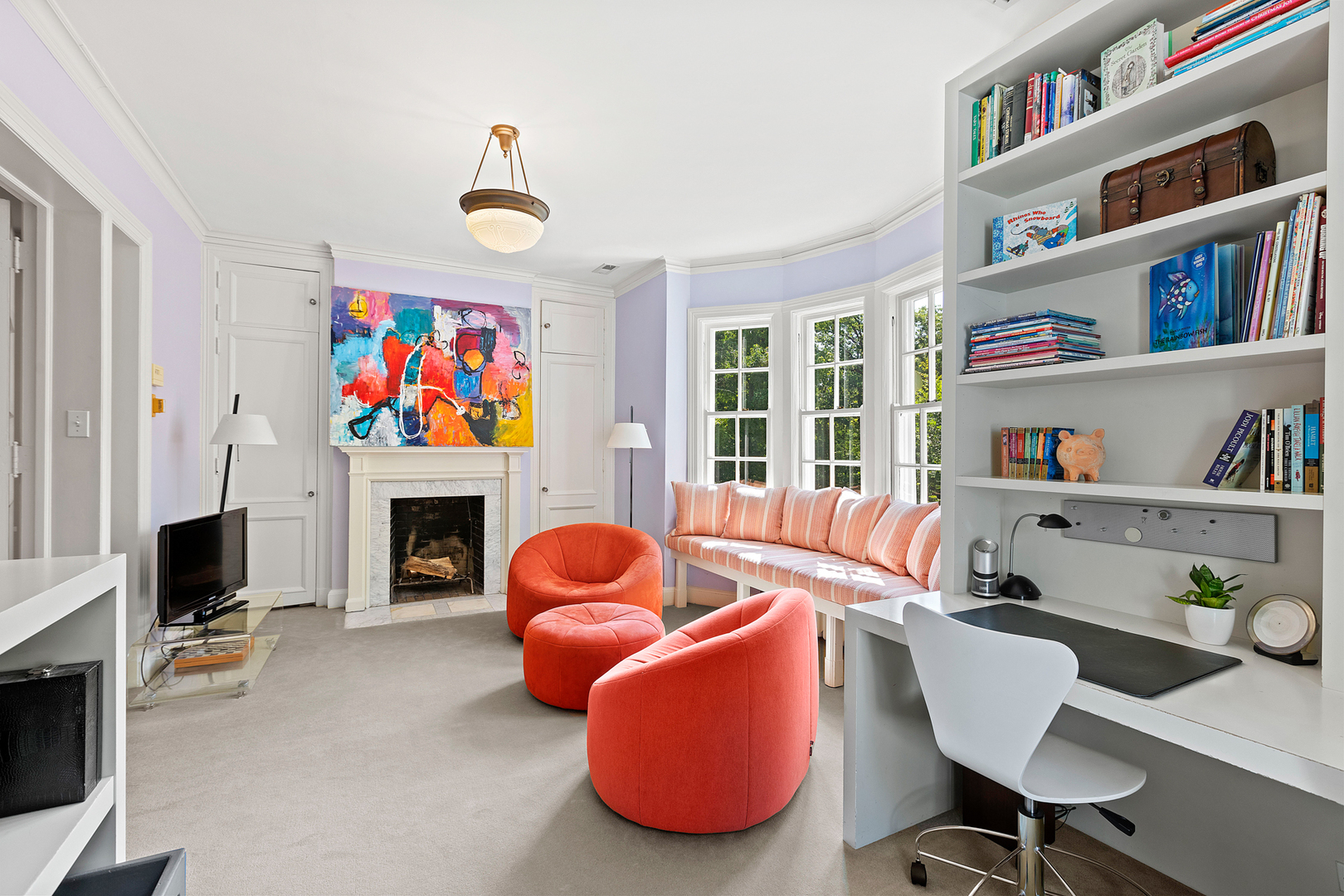 855 Sheridan Road Highland Park, IL 60035 - Photo 41 of 62 a living room with furniture a fireplace and a book shelf
