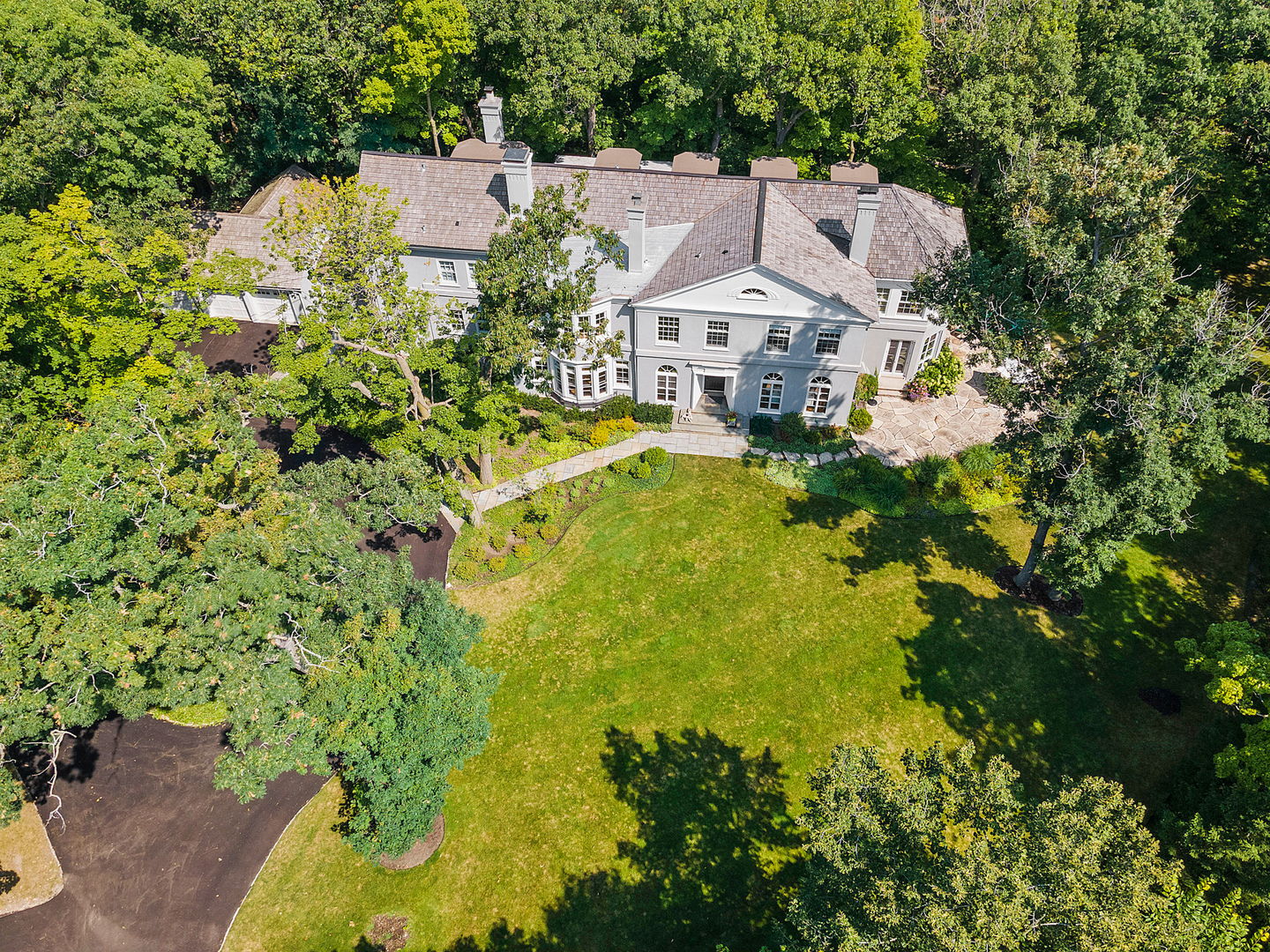 855 Sheridan Road Highland Park, IL 60035 - Photo 61 of 62 an aerial view of residential houses with yard and swimming pool