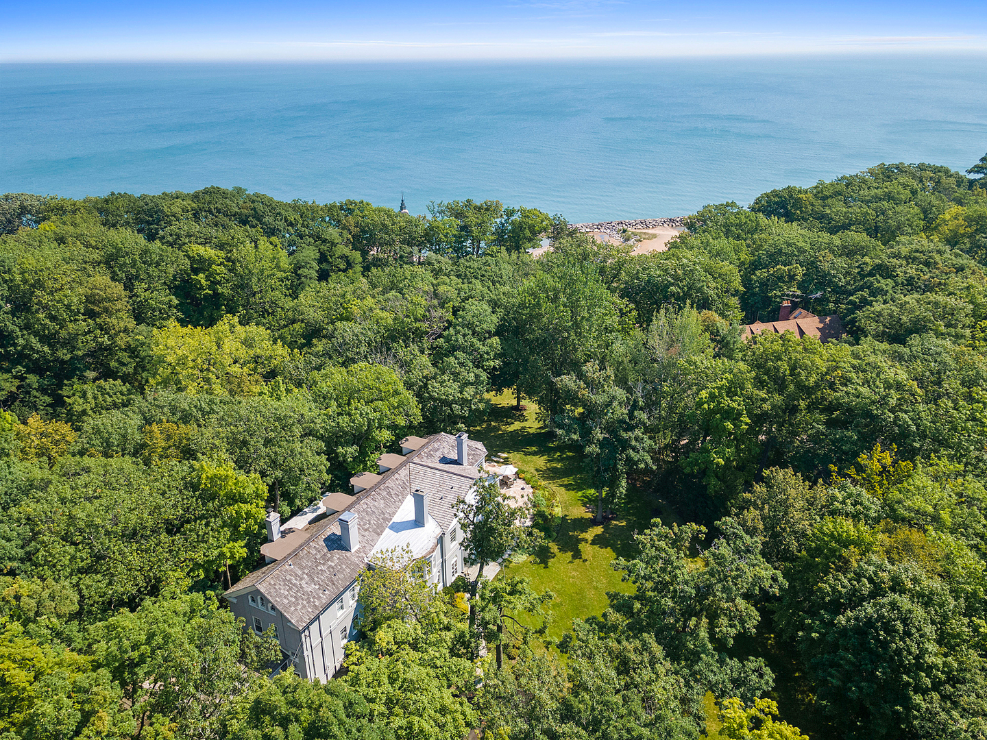 855 Sheridan Road Highland Park, IL 60035 - Photo 62 of 62 an aerial view of a house with ocean view